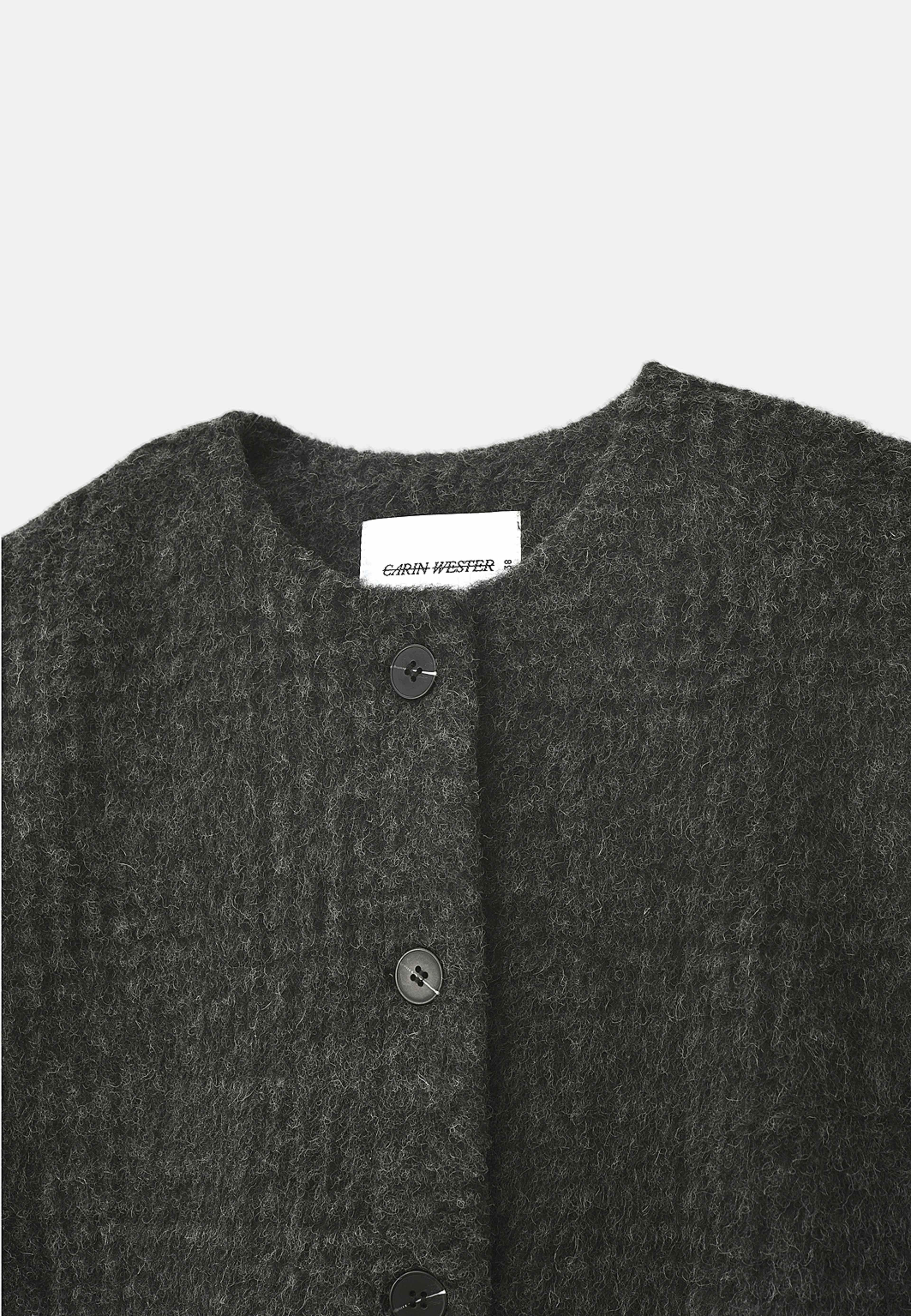 Väst i ullmix JERRY, från Carin Wester, i färgen Dark Grey Check. Klicka för att öppna bilden i stort format