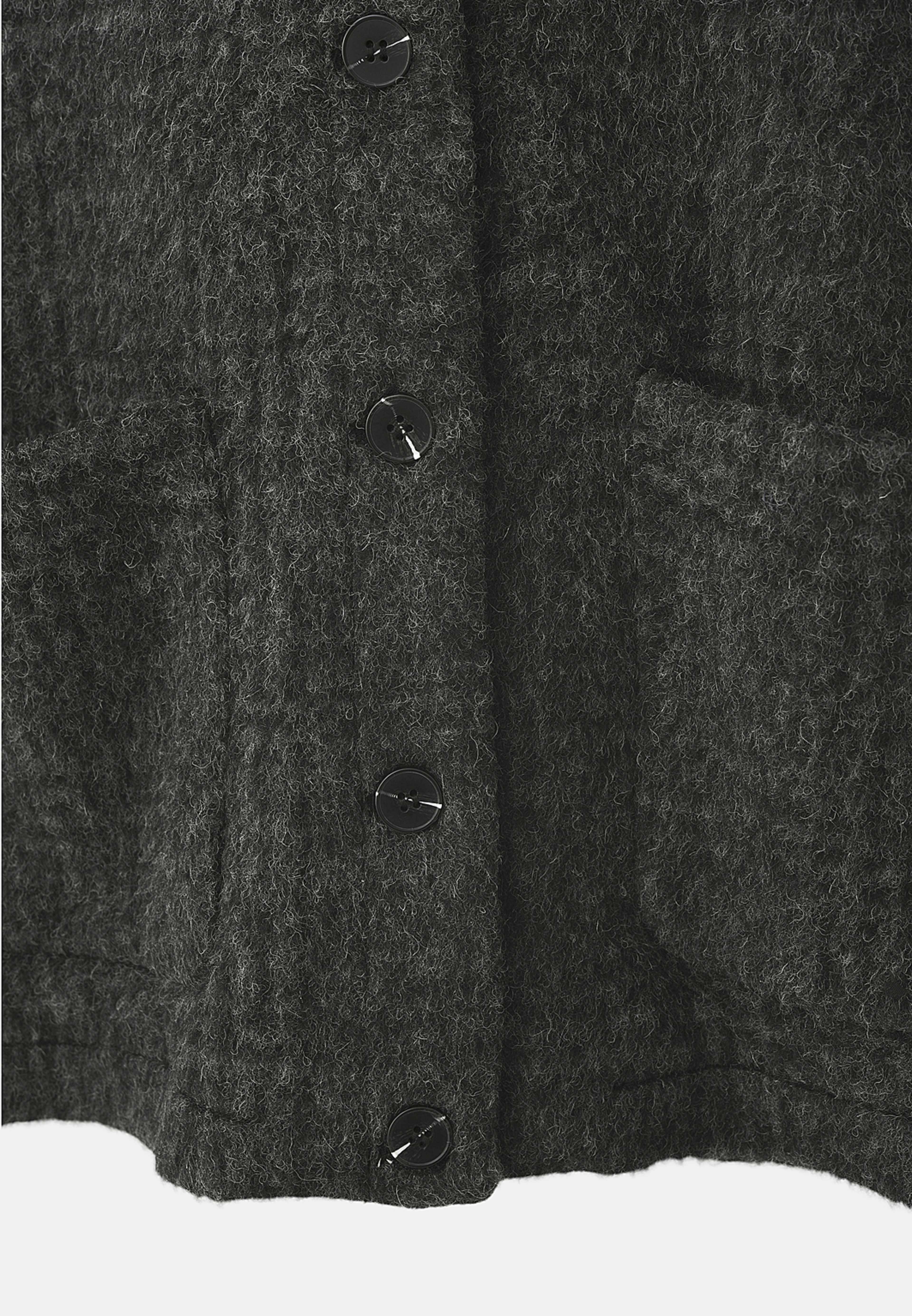 Väst i ullmix JERRY, från Carin Wester, i färgen Dark Grey Check. Klicka för att öppna bilden i stort format
