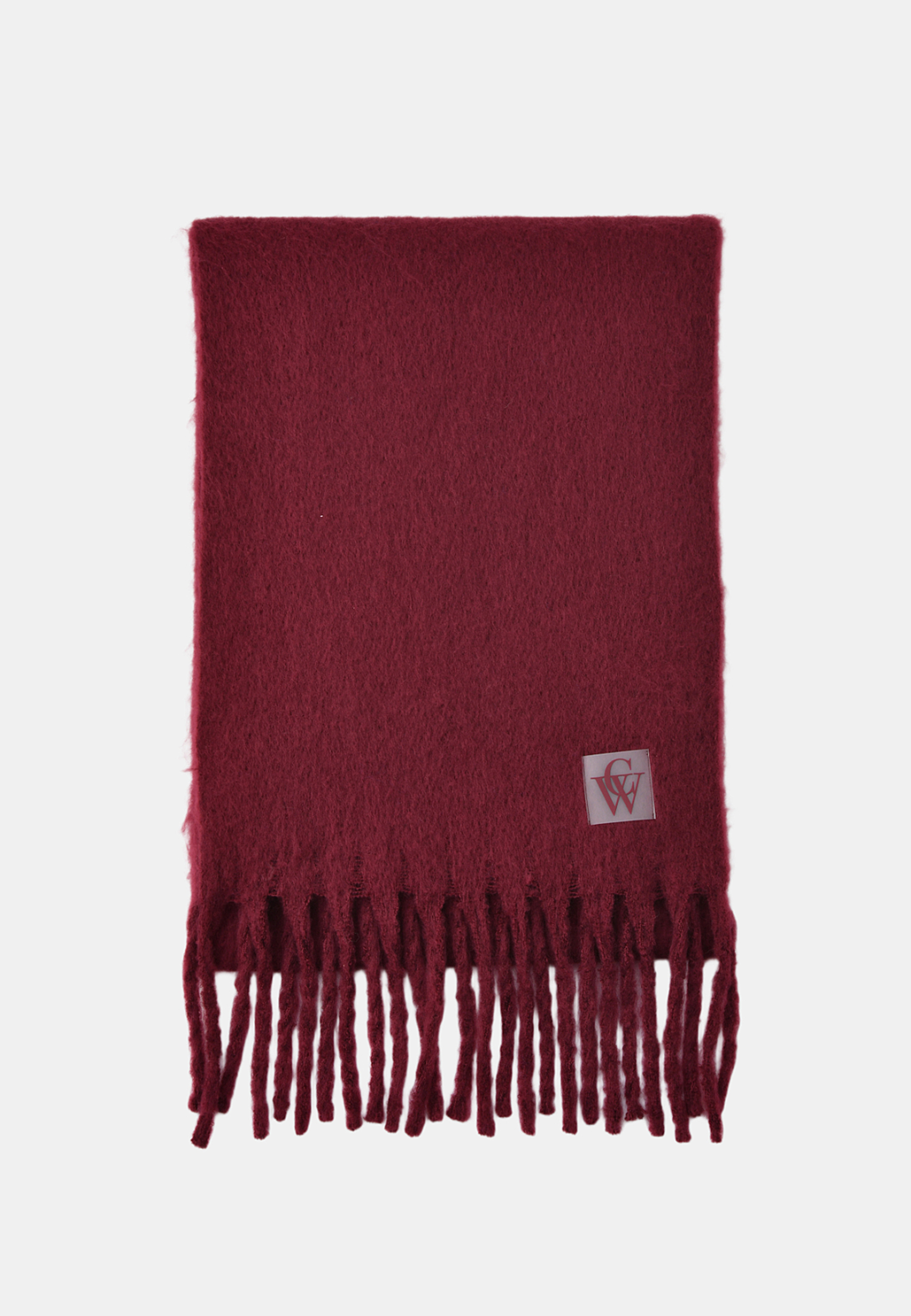 Stickad halsduk med fransar ADA, från Carin Wester, i färgen Wine Red. Klicka för att öppna bilden i stort format