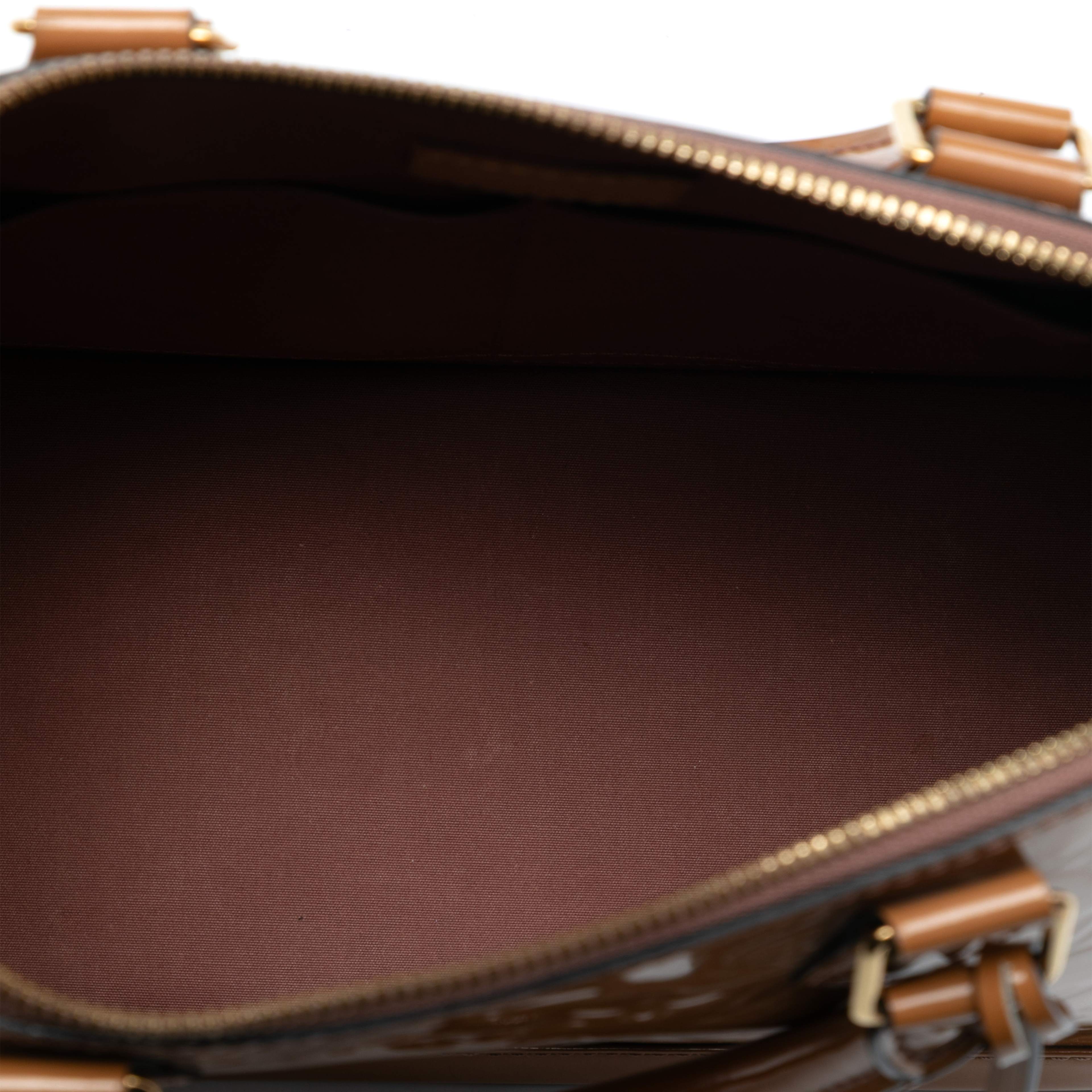 Louis Vuitton Monogram Vernis Alma Pm, från Luxclusif, i färgen brown. Klicka för att öppna bilden i stort format