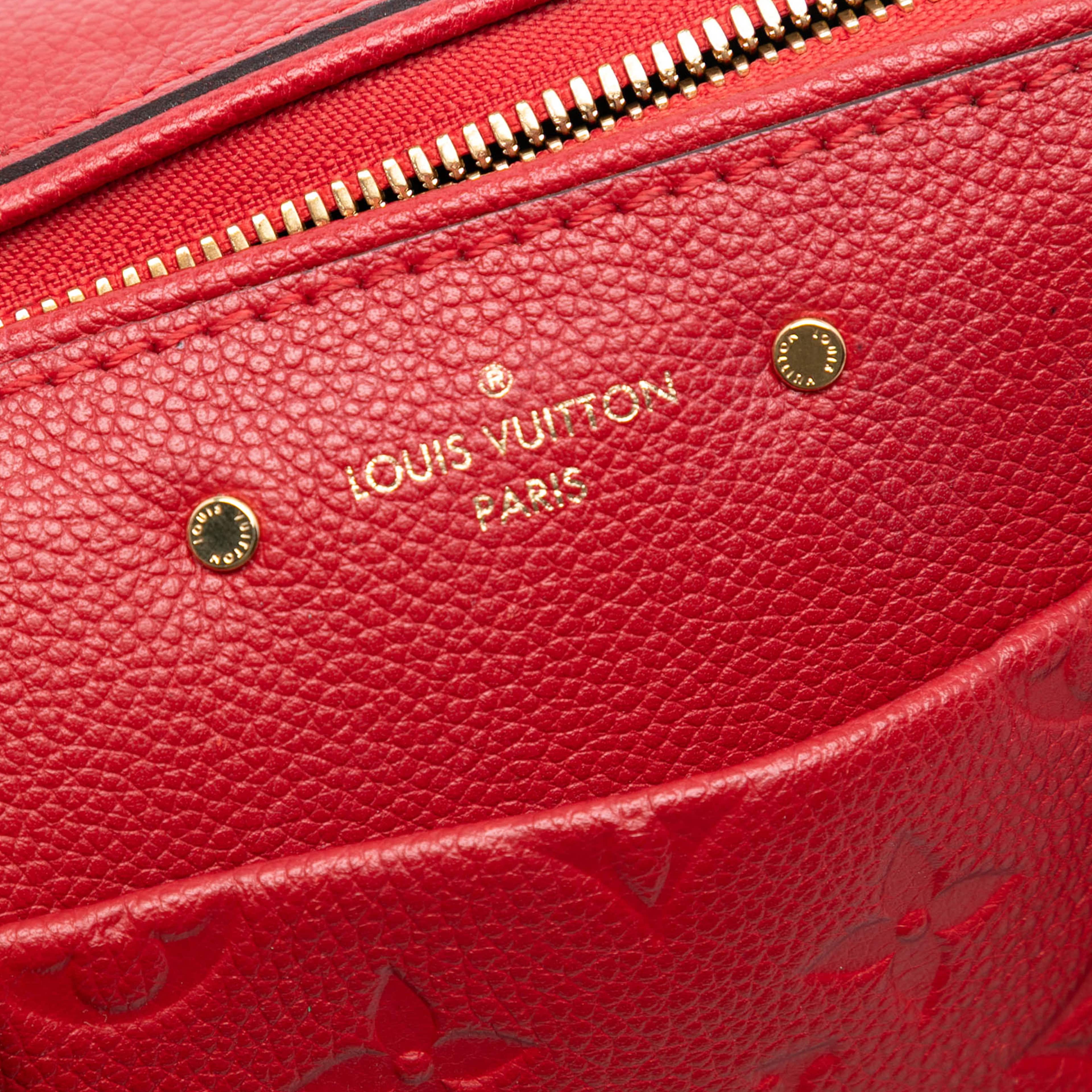 Louis Vuitton Monogram Empreinte Speedy Bandouliere 25, från Luxclusif, i färgen red. Klicka för att öppna bilden i stort format