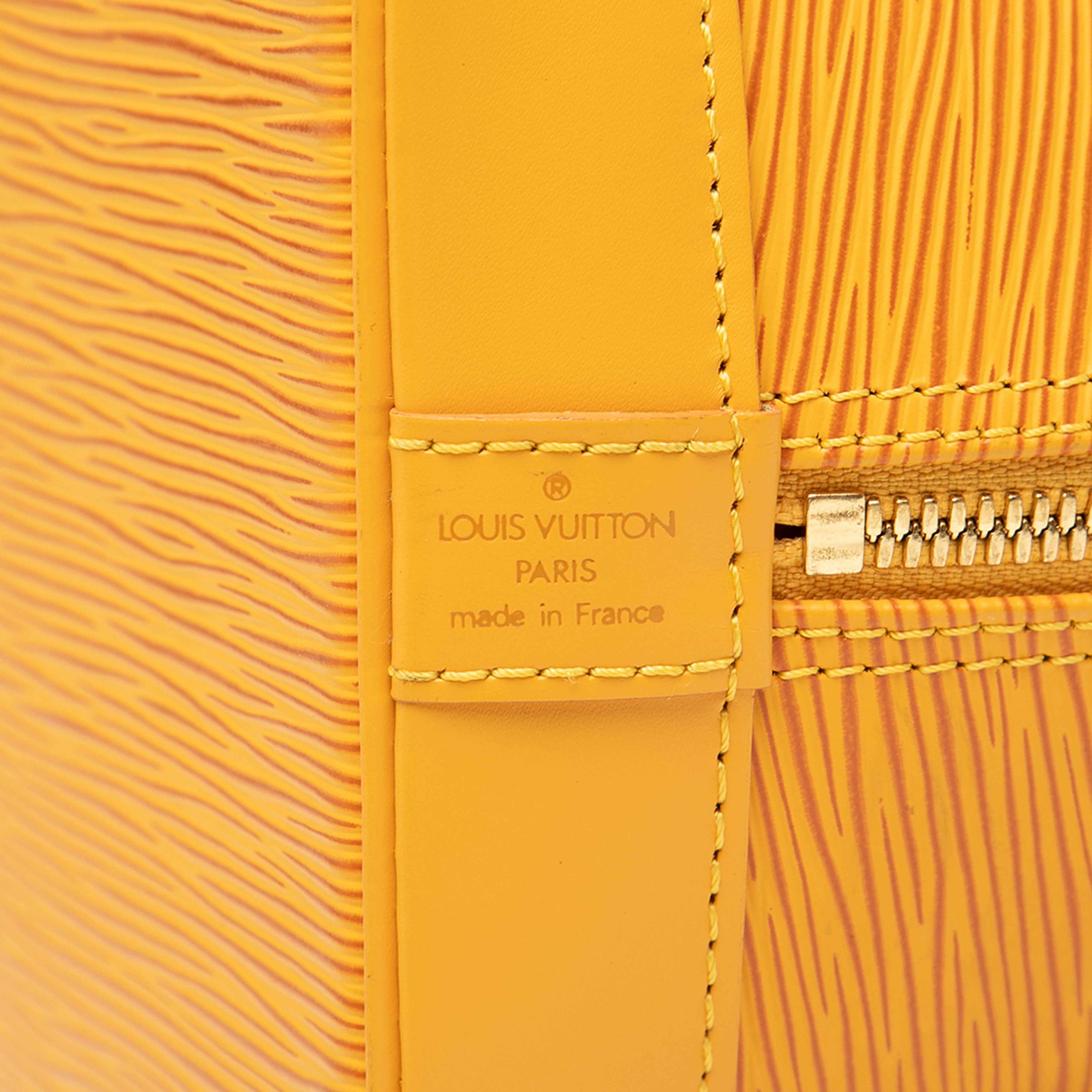 Louis Vuitton Epi Alma Pm, från Luxclusif, i färgen yellow. Klicka för att öppna bilden i stort format