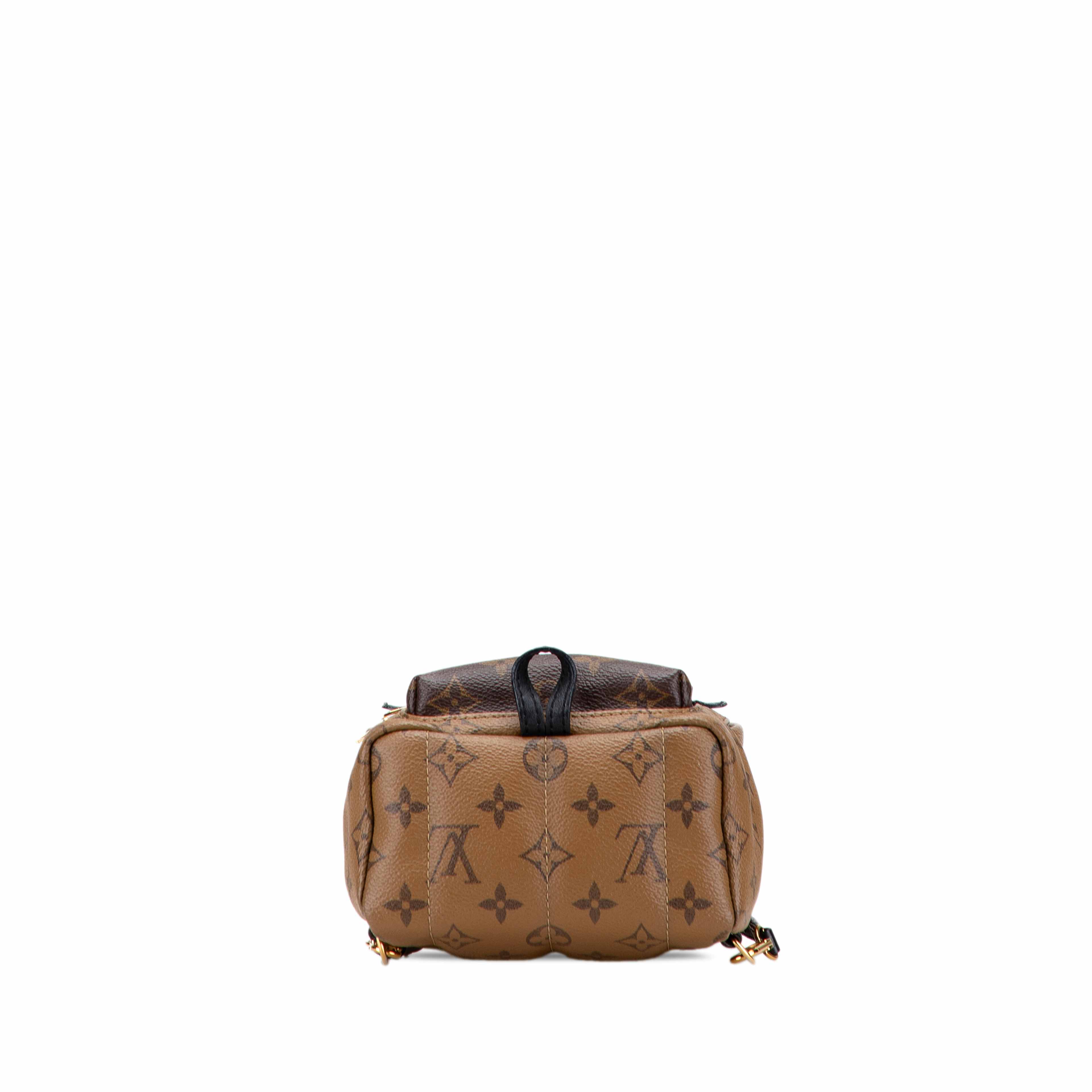 Louis Vuitton Monogram Reverse Mini Palm Springs, från Luxclusif, i färgen brun. Klicka för att öppna bilden i stort format