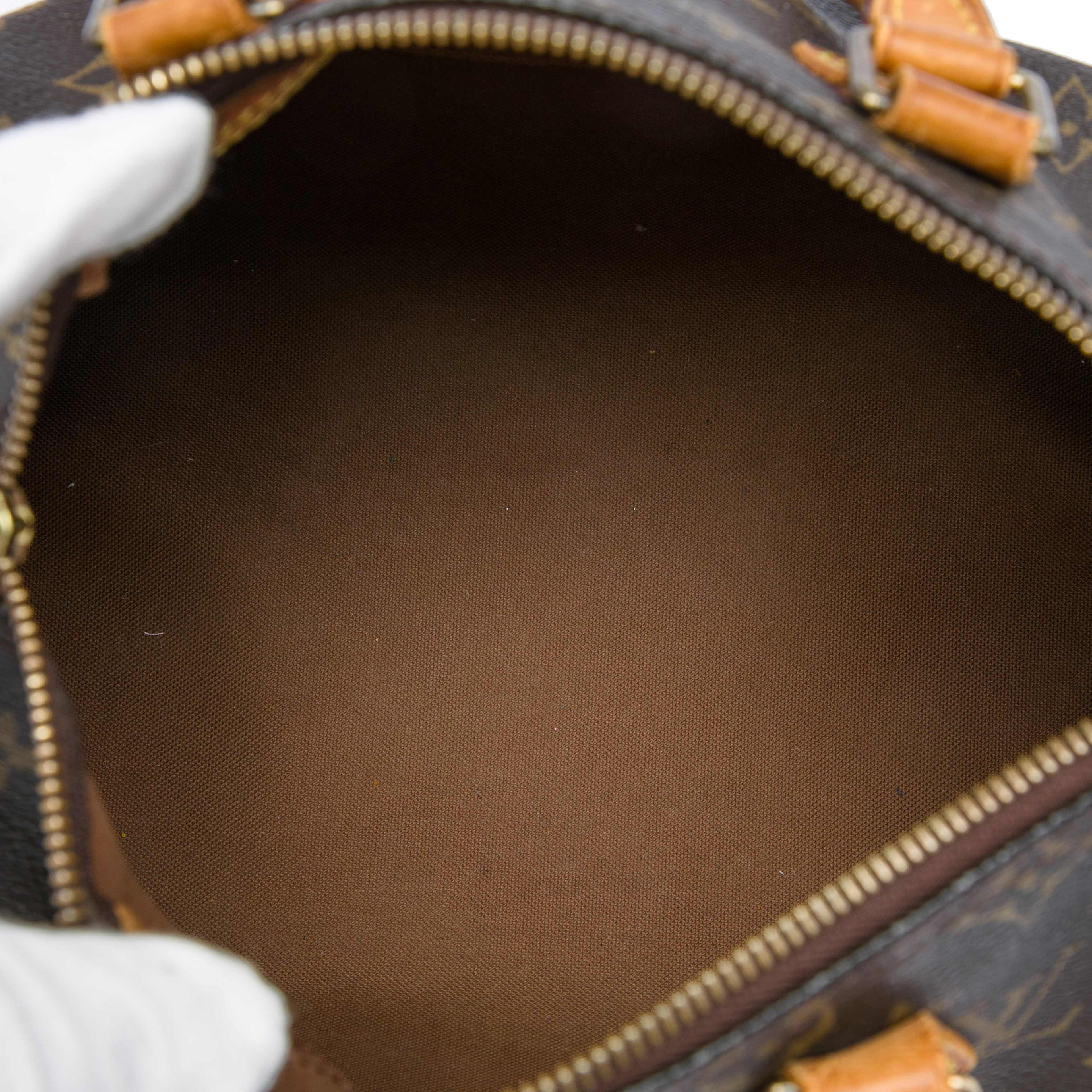 Louis Vuitton Monogram Speedy 25, från Luxclusif, i färgen brun. Klicka för att öppna bilden i stort format