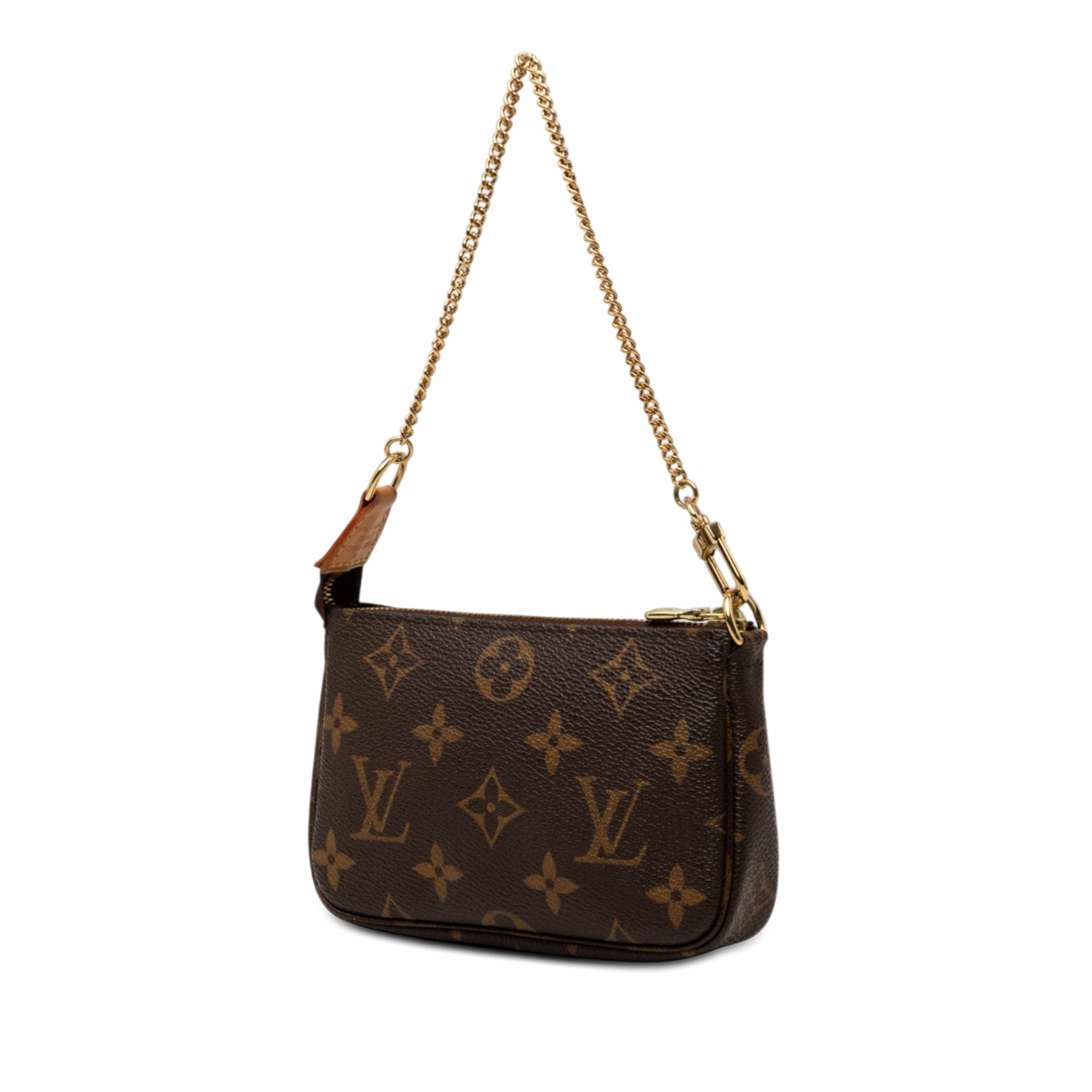 Louis Vuitton Monogram Mini Pochette Accessoires, från Luxclusif, i färgen brun. Klicka för att öppna bilden i stort format