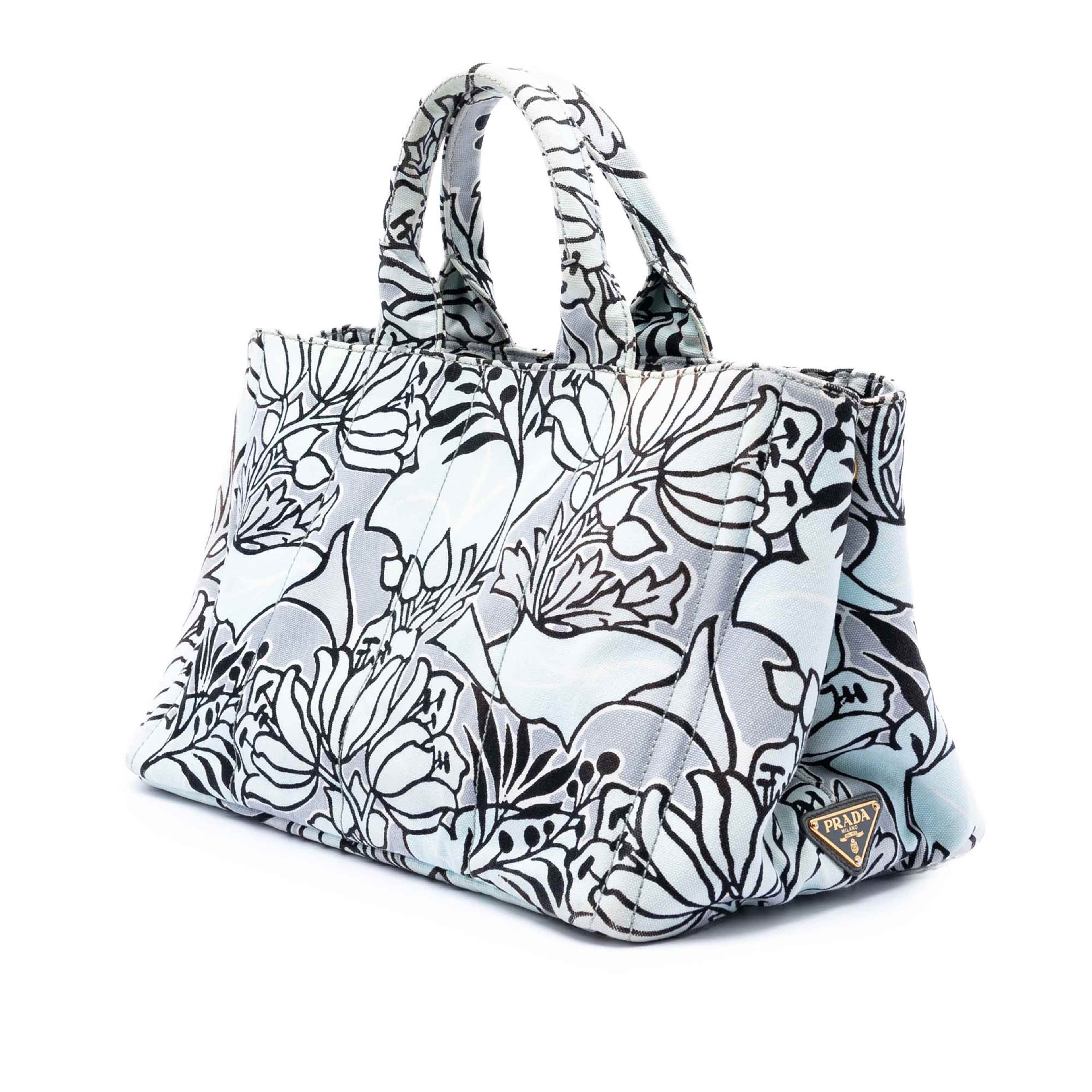 Prada Medium Floral Printed Canvas Canapa Satchel, från Luxclusif, i färgen blå. Klicka för att öppna bilden i stort format