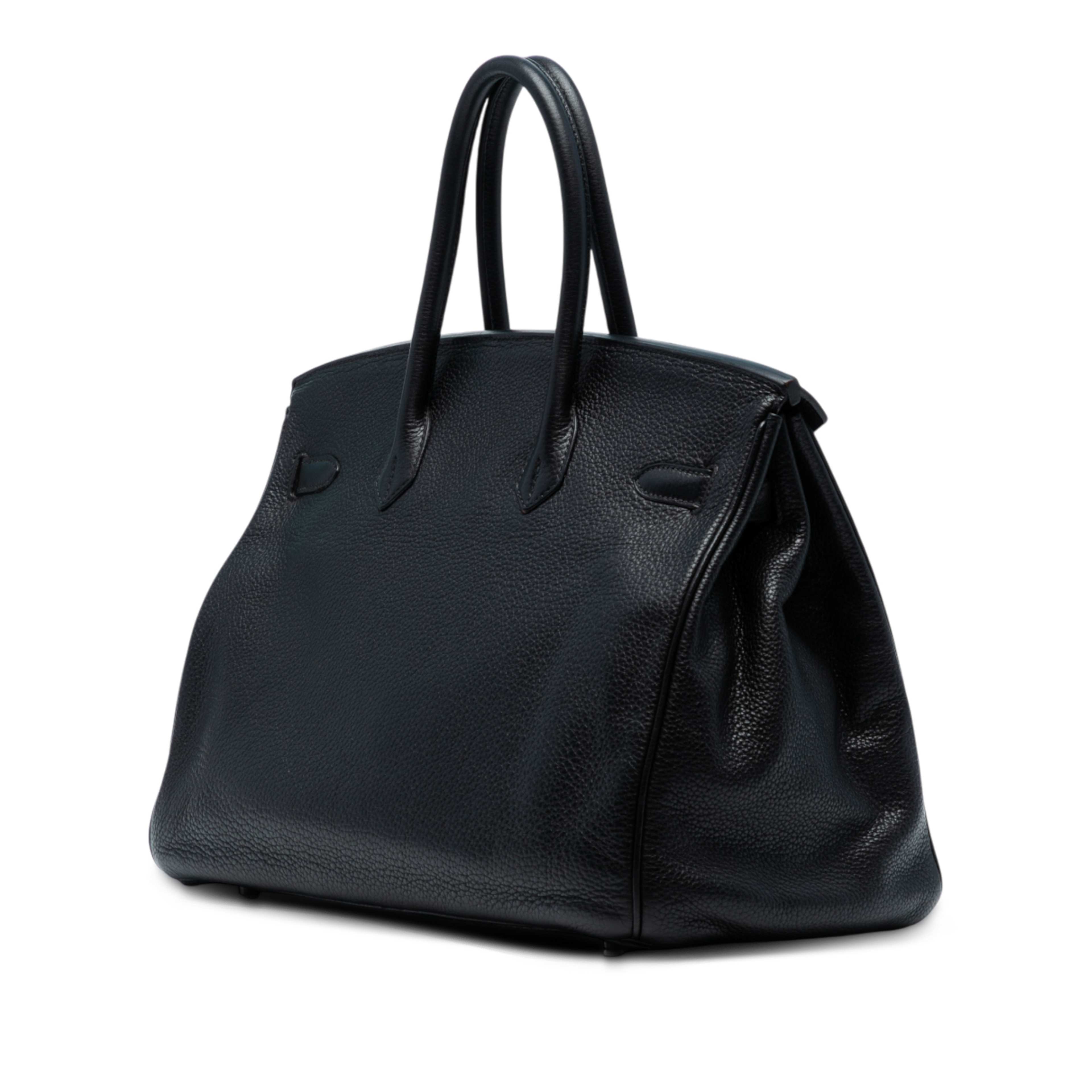 Hermès Togo Birkin Retourne 35, från Luxclusif, i färgen black. Klicka för att öppna bilden i stort format