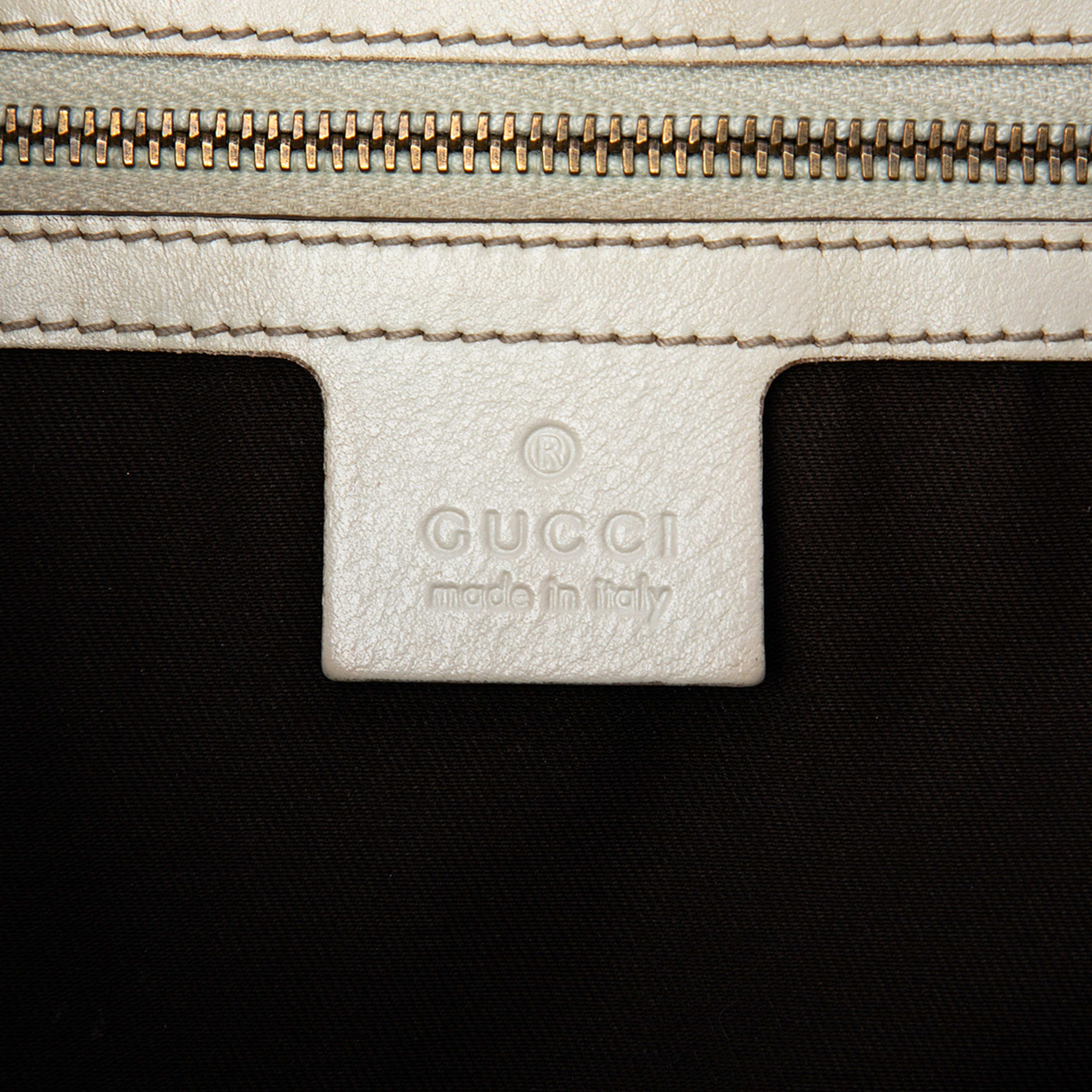Gucci Gg Canvas Interlocking Icon Drawstring Hobo, från Luxclusif, i färgen beige. Klicka för att öppna bilden i stort format