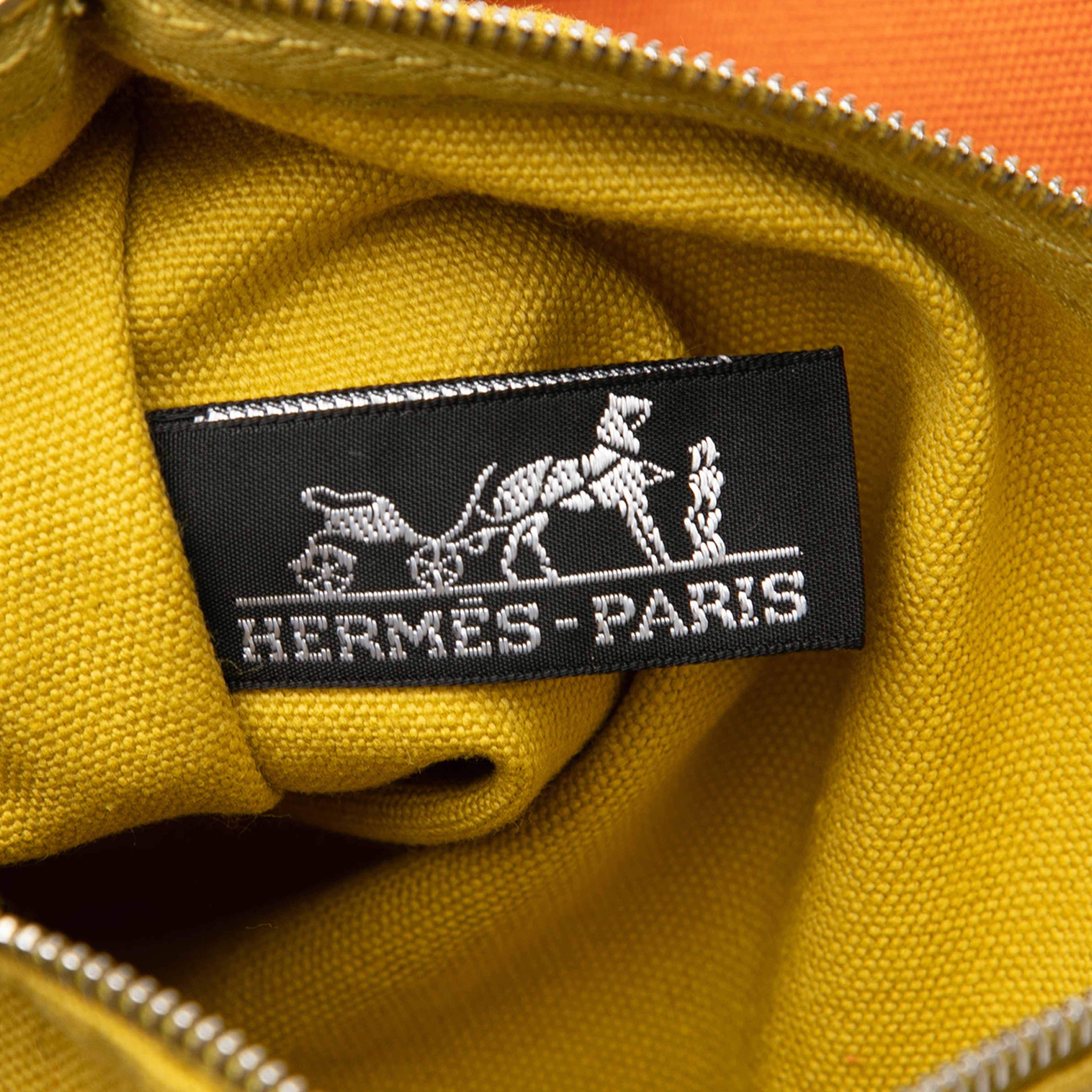Hermès Toile Lindy Beach Bag, från Luxclusif, i färgen orange. Klicka för att öppna bilden i stort format
