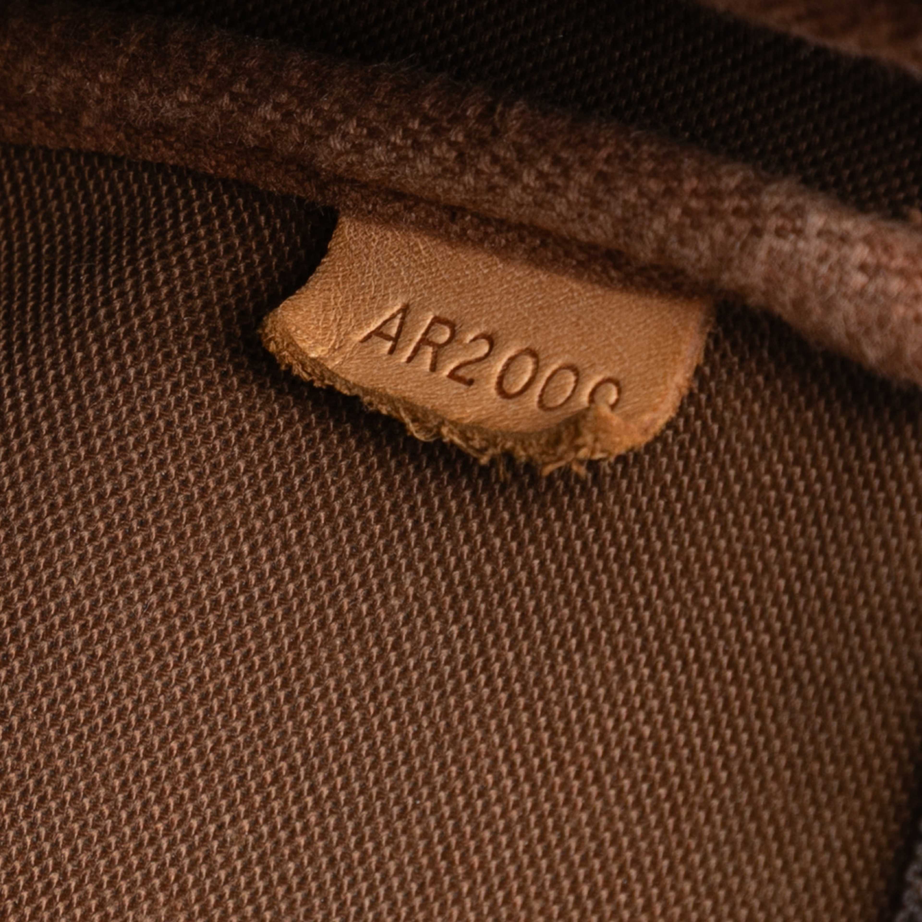 Louis Vuitton Monogram Pochette Accessoires, från Luxclusif, i färgen brown. Klicka för att öppna bilden i stort format