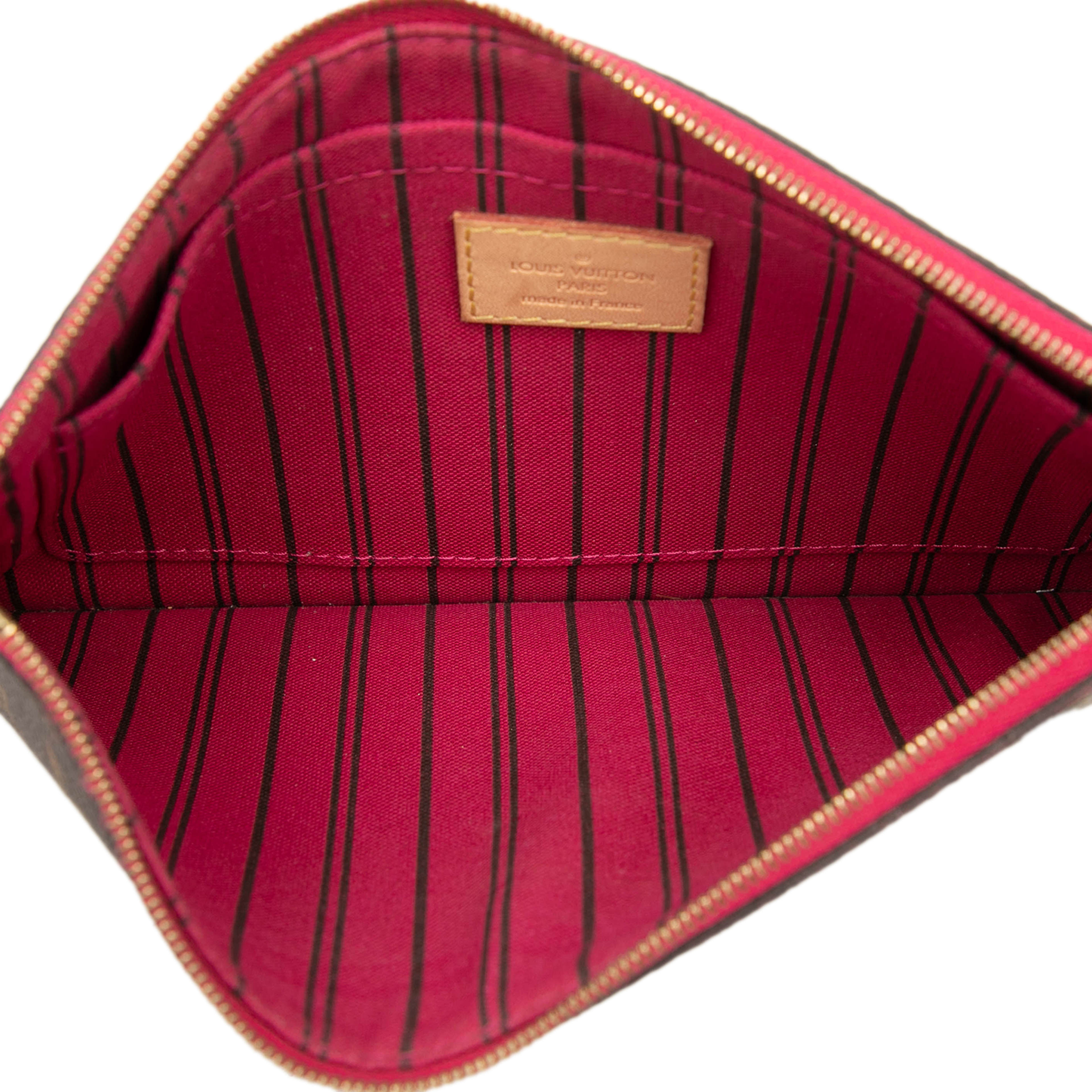 Louis Vuitton Monogram Neverfull Mm Pouch, från Luxclusif, i färgen brun. Klicka för att öppna bilden i stort format