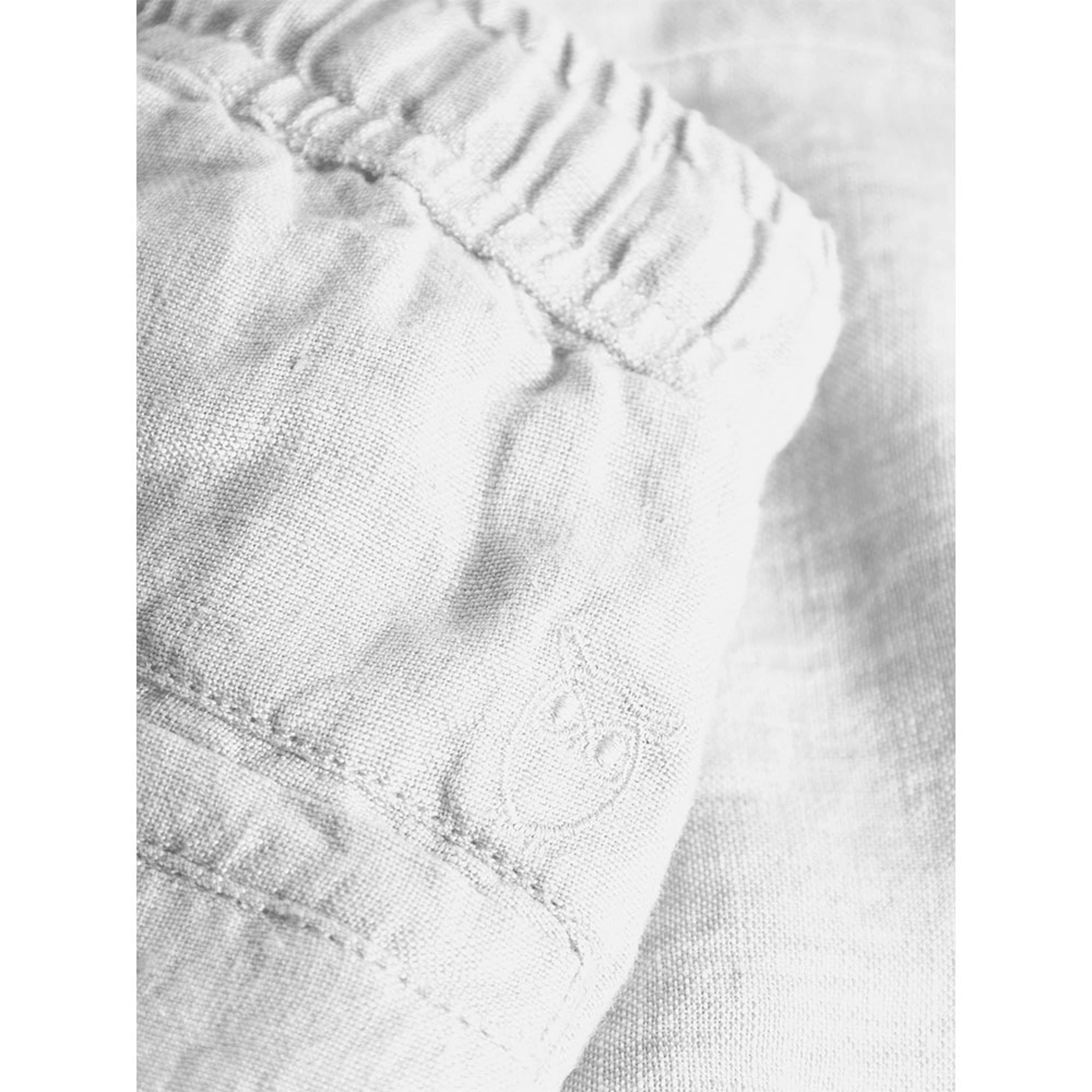 Loose Linen Pant, från Knowledge Cotton Apparel, i färgen Bright White. Klicka för att öppna bilden i stort format