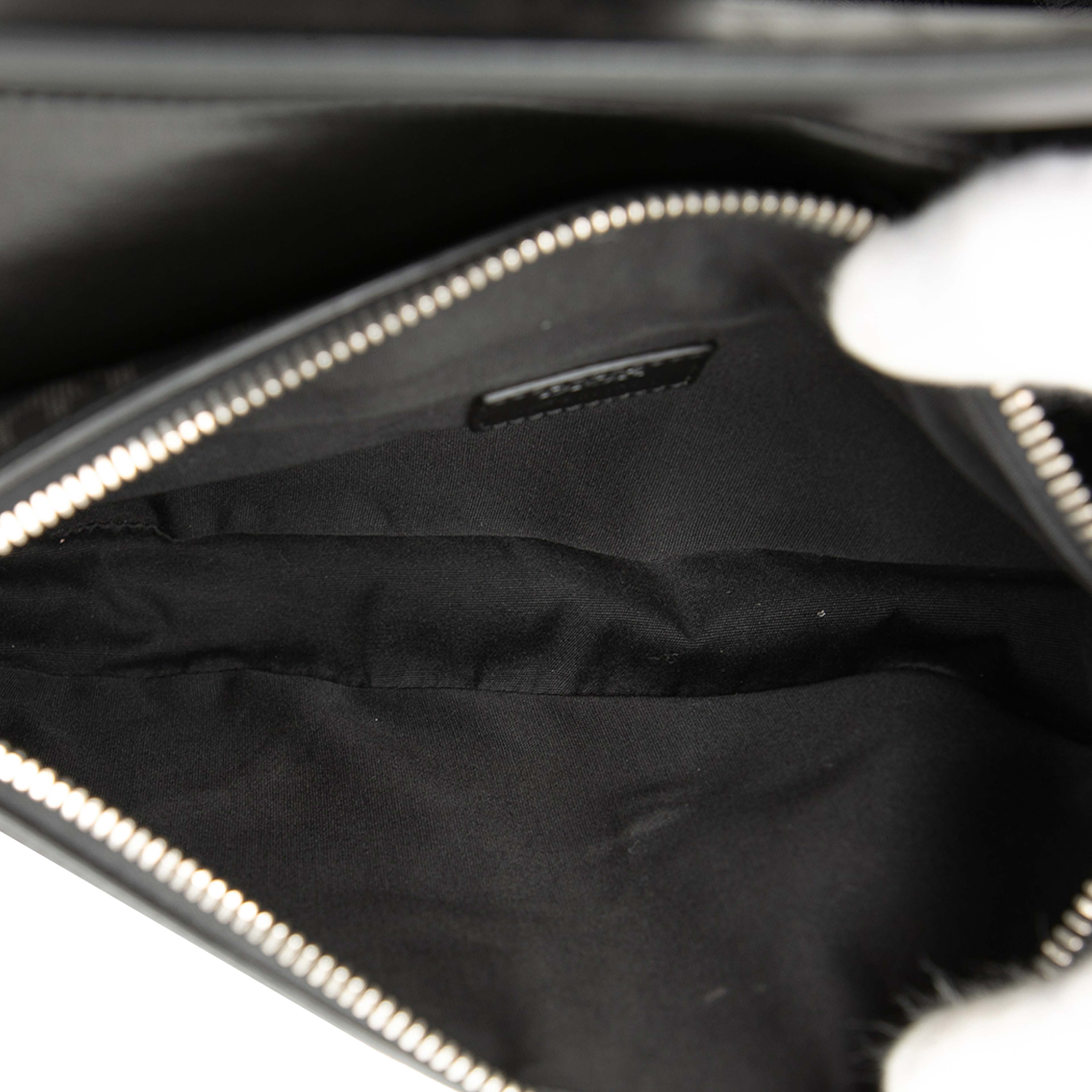 Dior Oblique Perforated Calfskin Galaxy Saddle Bag, från Luxclusif, i färgen black. Klicka för att öppna bilden i stort format