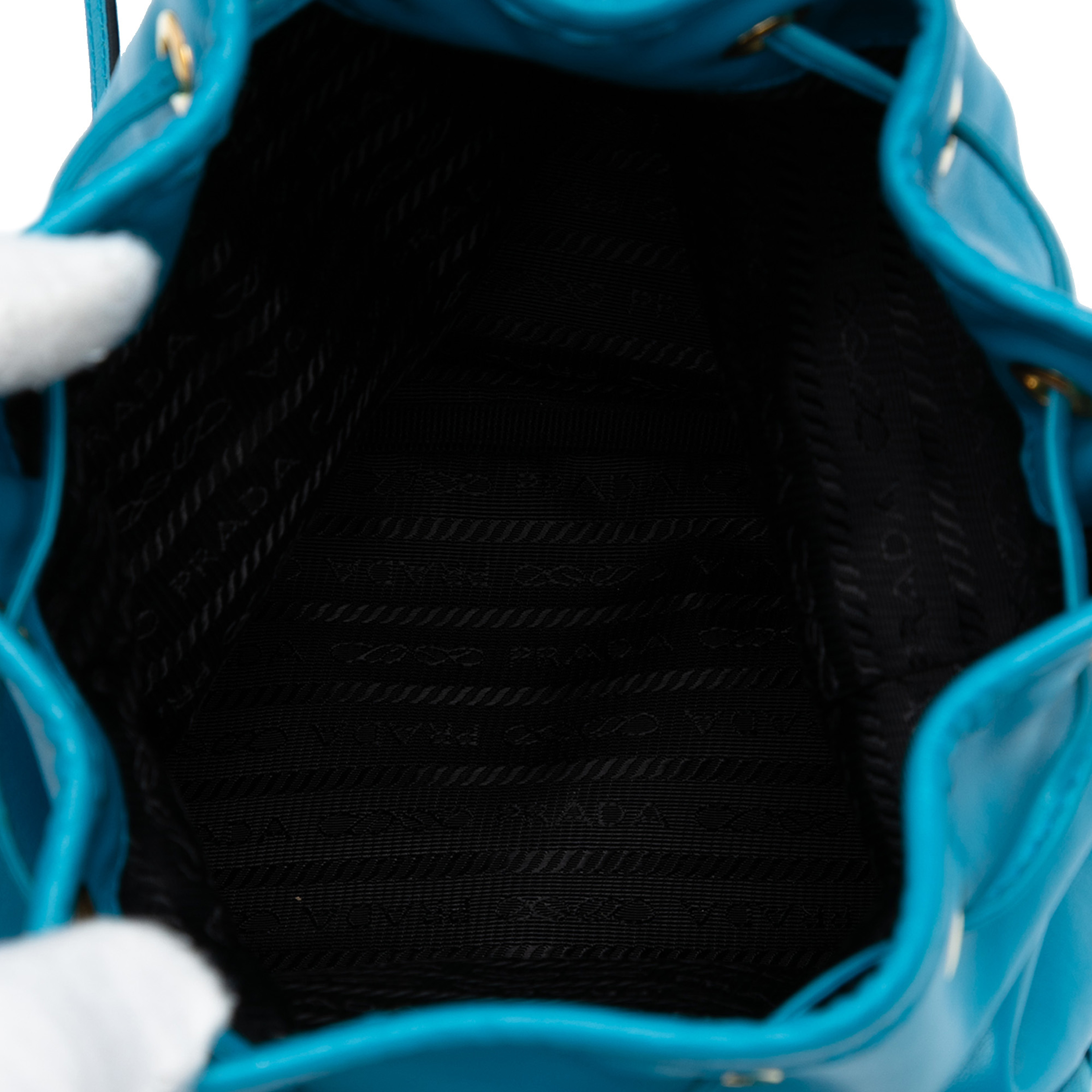 Prada Mini Soft Calf Drawstring Bucket Bag, från Luxclusif, i färgen blue. Klicka för att öppna bilden i stort format