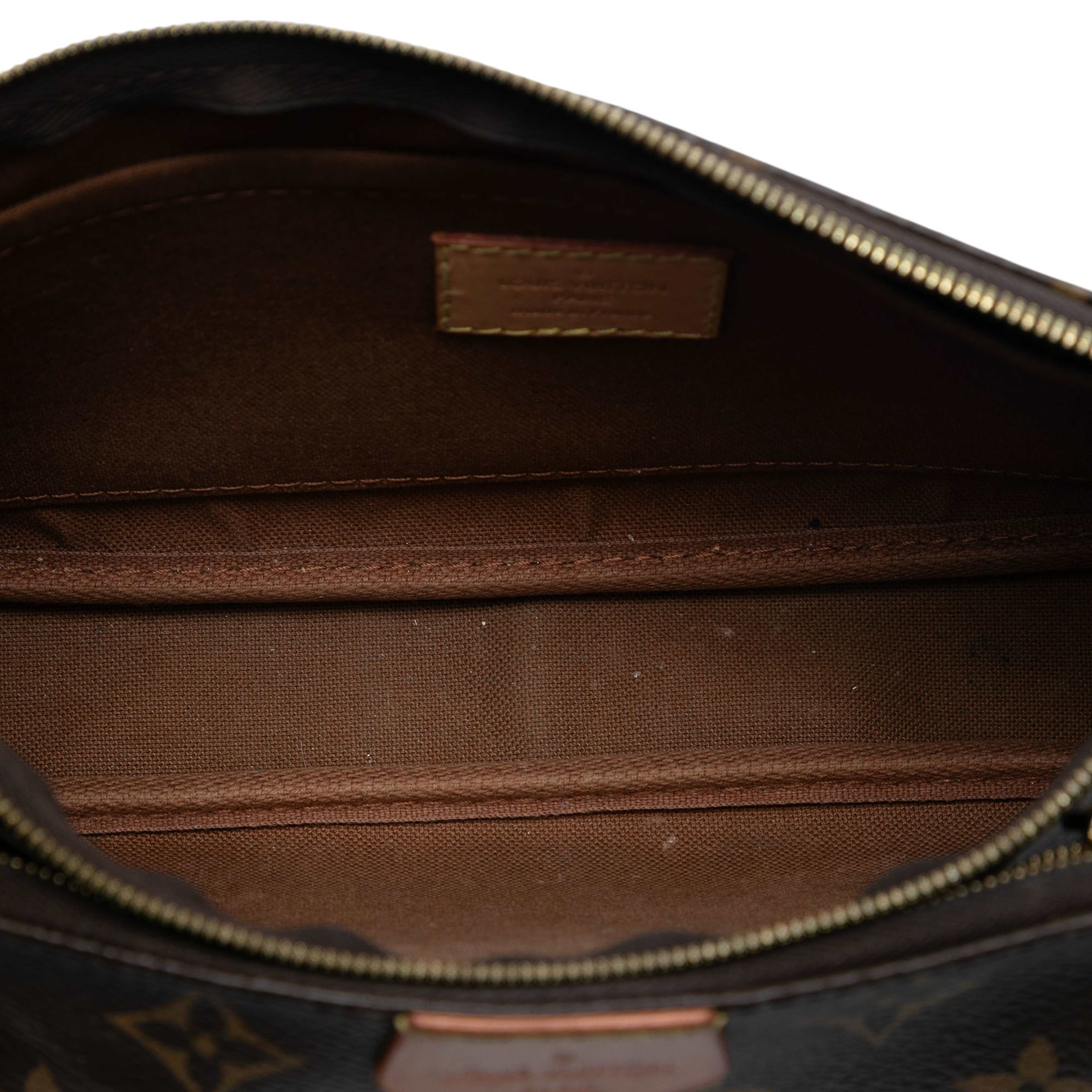 Louis Vuitton Monogram Multi Pochette Accessoires, från Luxclusif, i färgen brown. Klicka för att öppna bilden i stort format