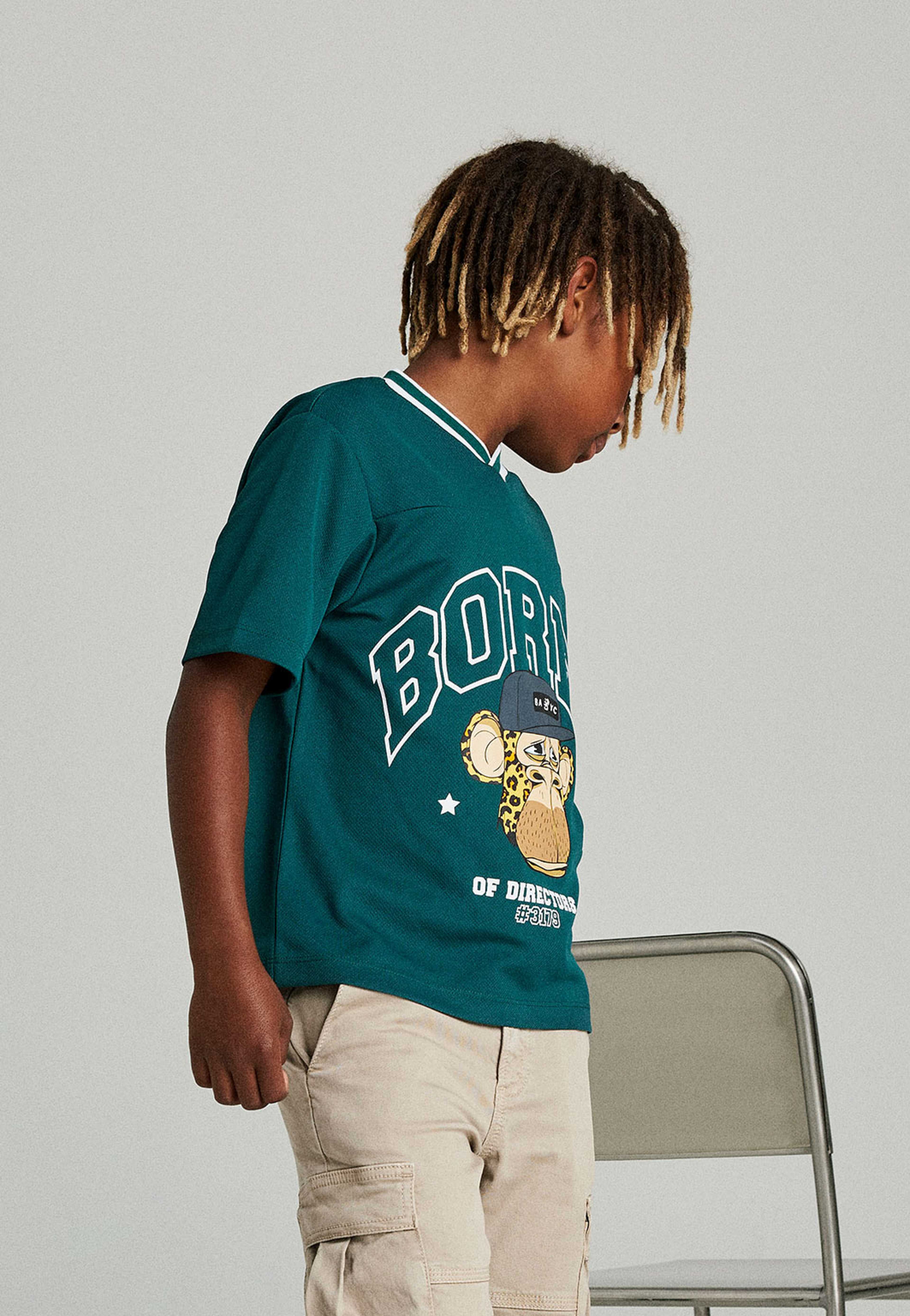 NKMFRODY BOD NREG SS POLY TOP SKY