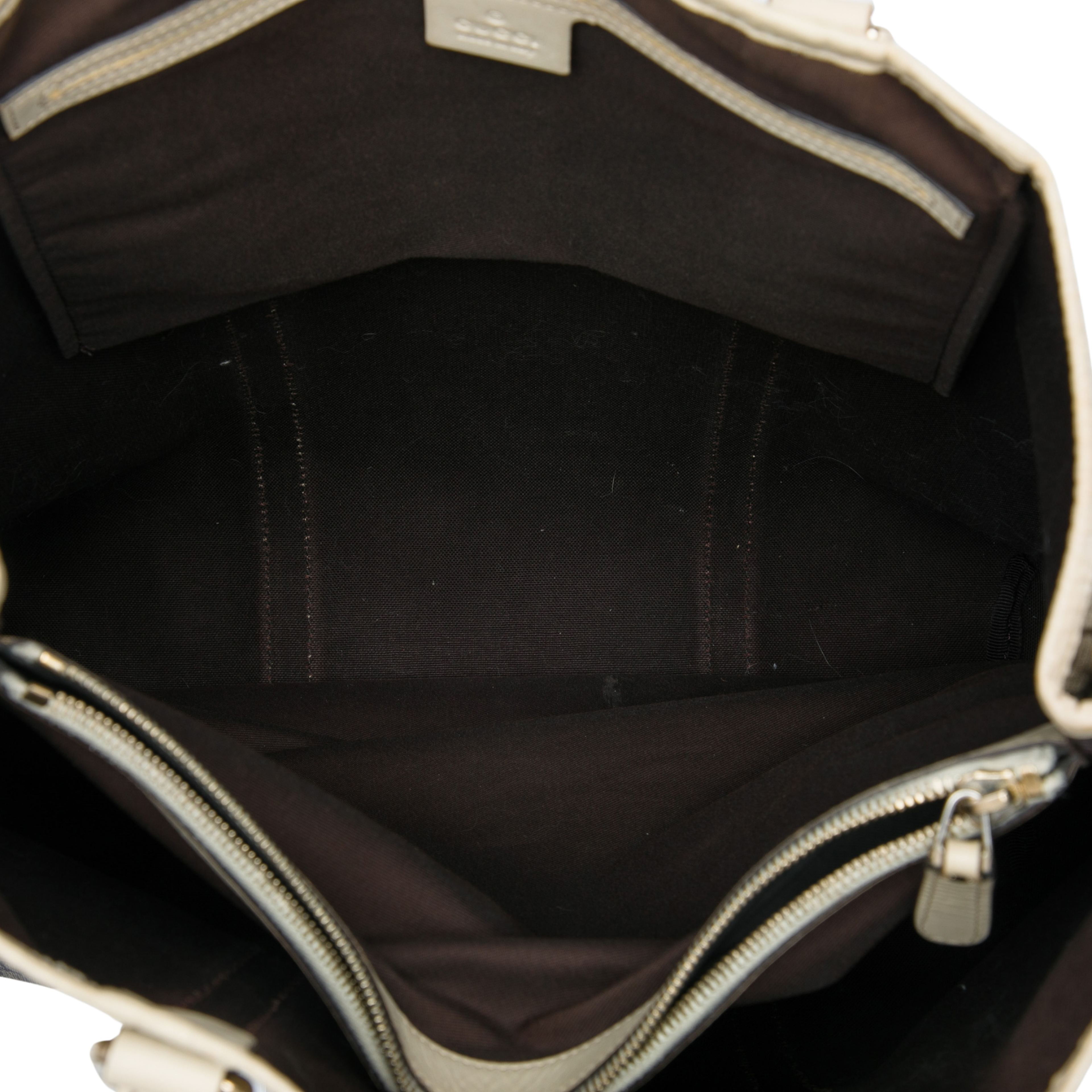 Gucci Gg Supreme Joy Vertical Tote, från Luxclusif, i färgen beige. Klicka för att öppna bilden i stort format