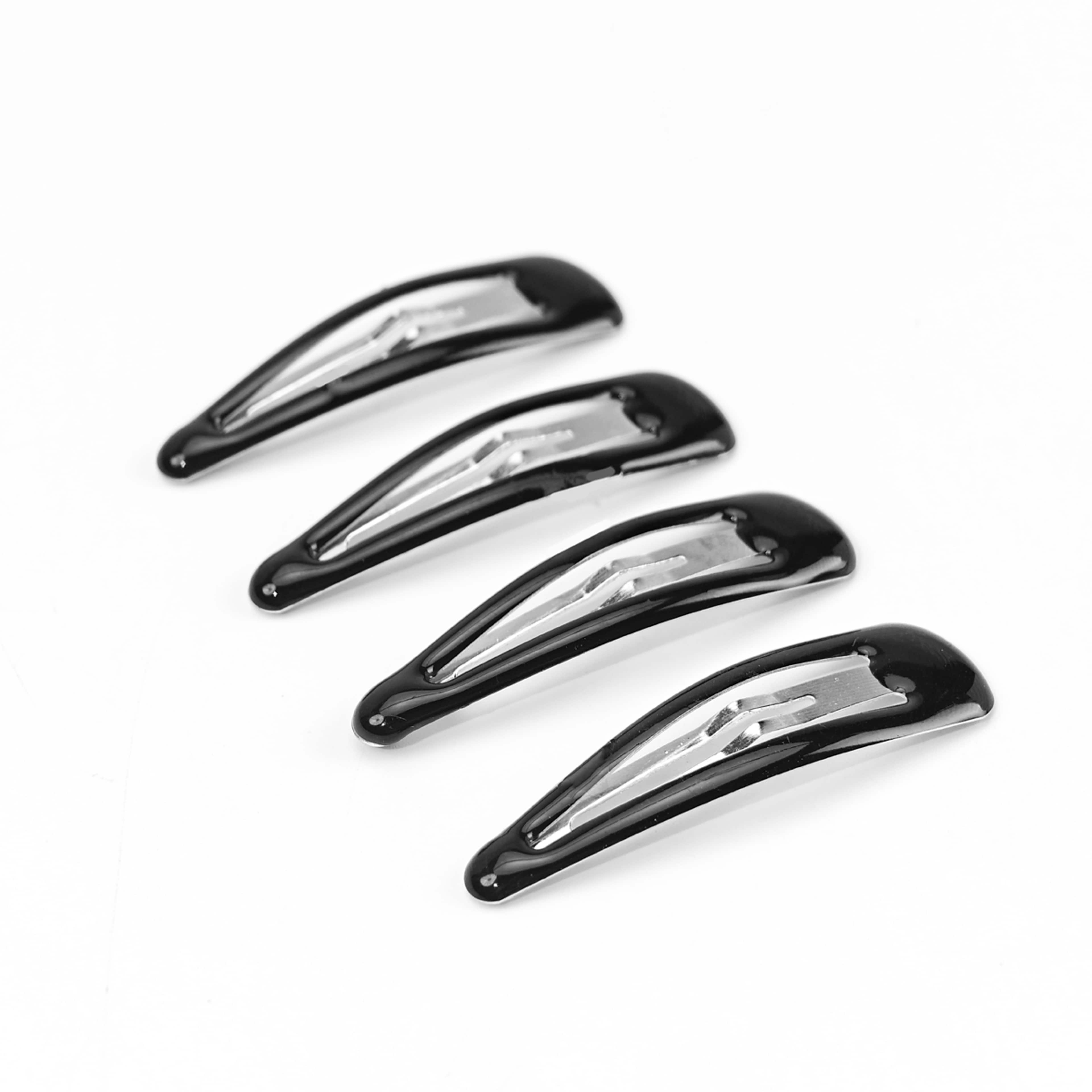 Hårspännen, 4-pack, från Å BEAUTY, i färgen Black. Klicka för att öppna bilden i stort format