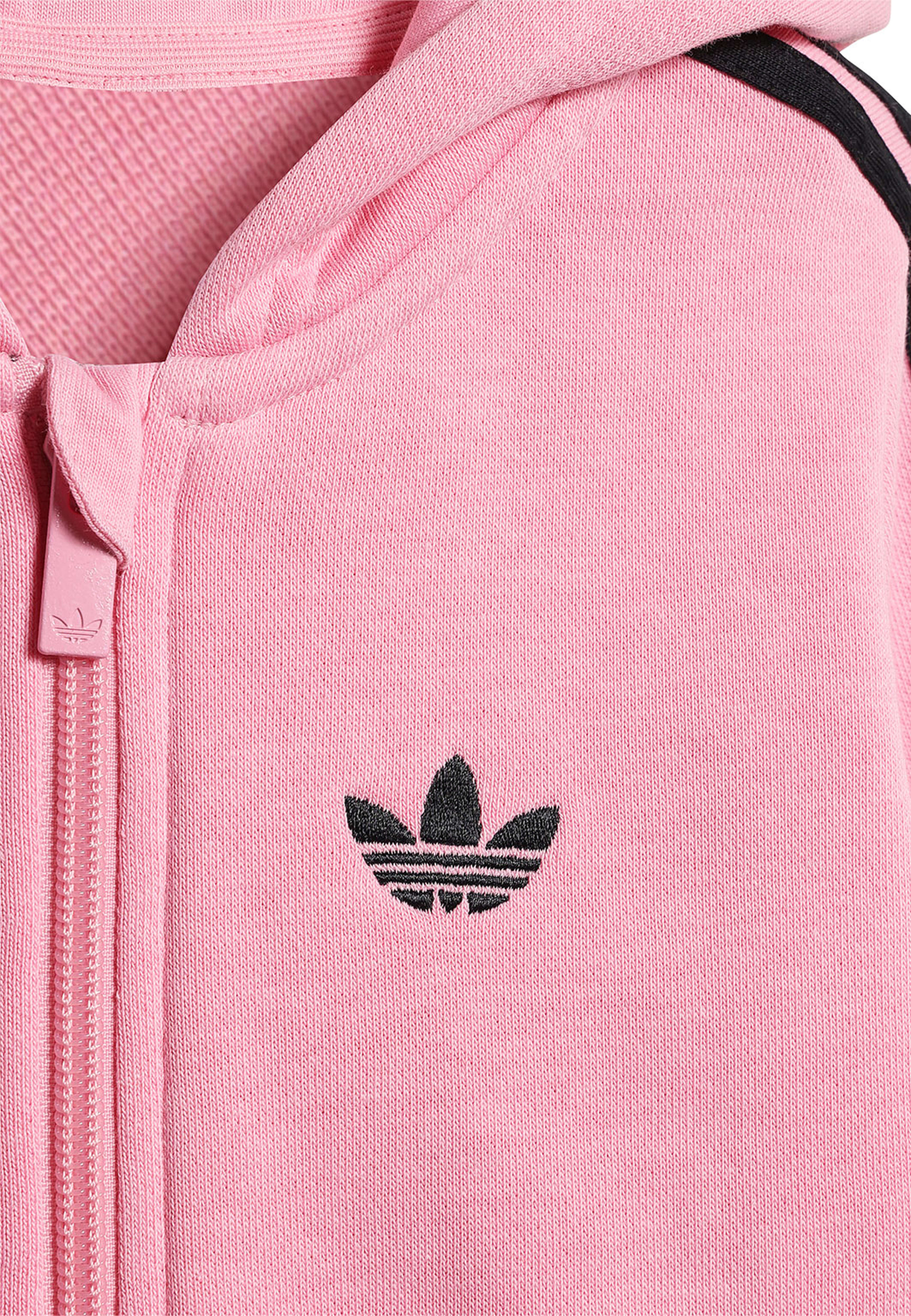 3 Stripes Onesie, från Adidas Originals, i färgen Ltpink. Klicka för att öppna bilden i stort format