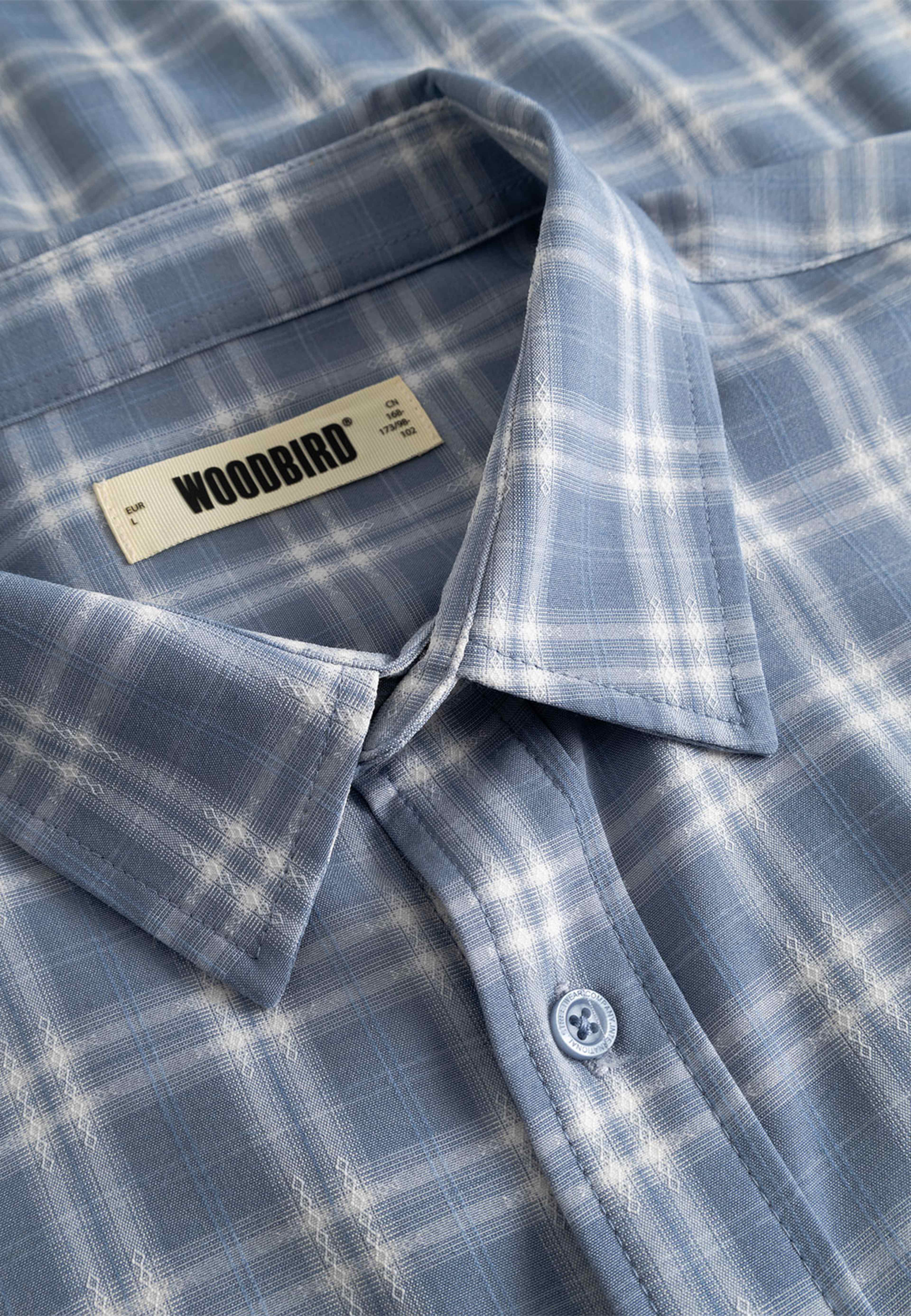 Jong Dobby Check Shirt, från Woodbird, i färgen Light Blue. Klicka för att öppna bilden i stort format