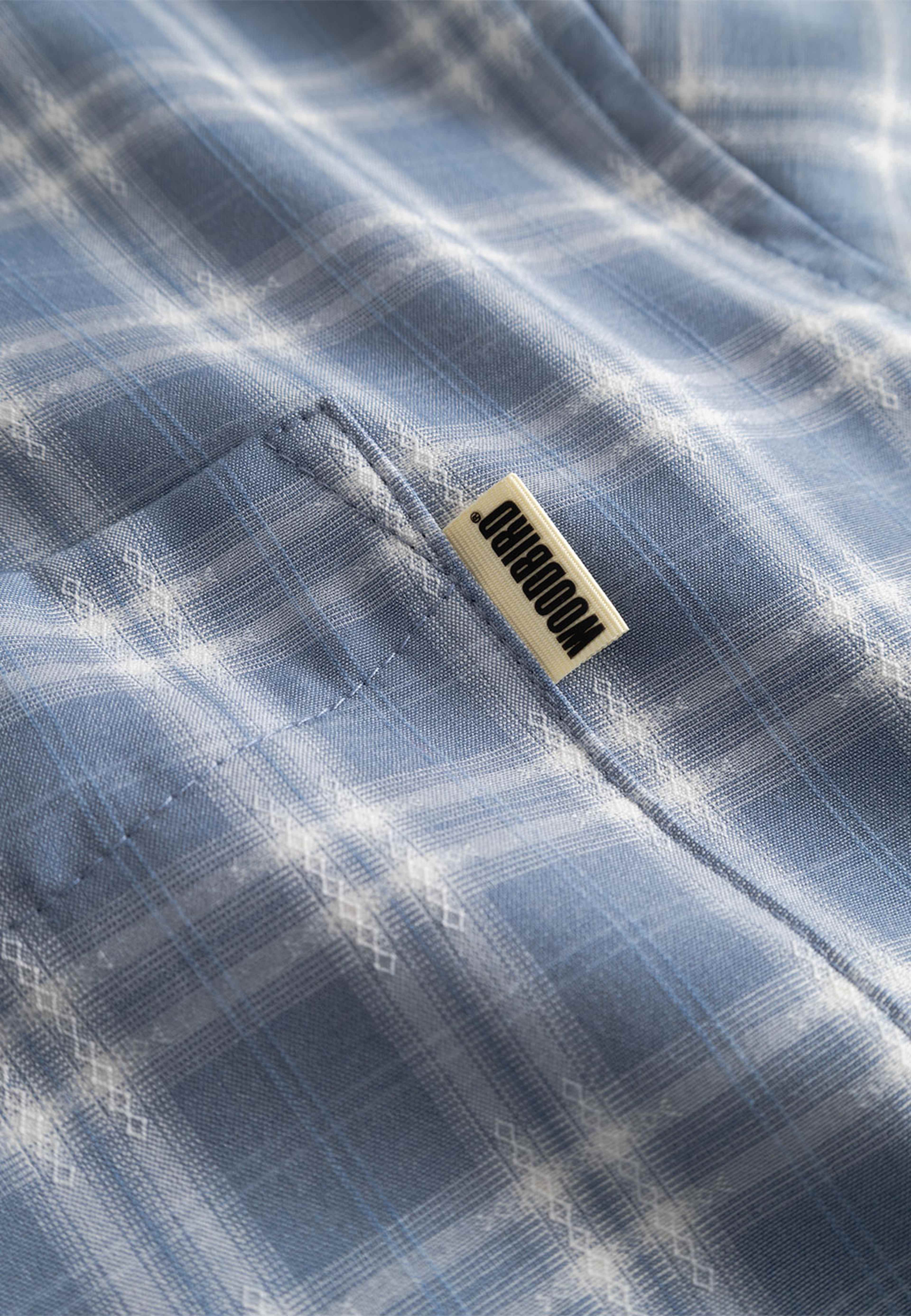 Jong Dobby Check Shirt, från Woodbird, i färgen Light Blue. Klicka för att öppna bilden i stort format