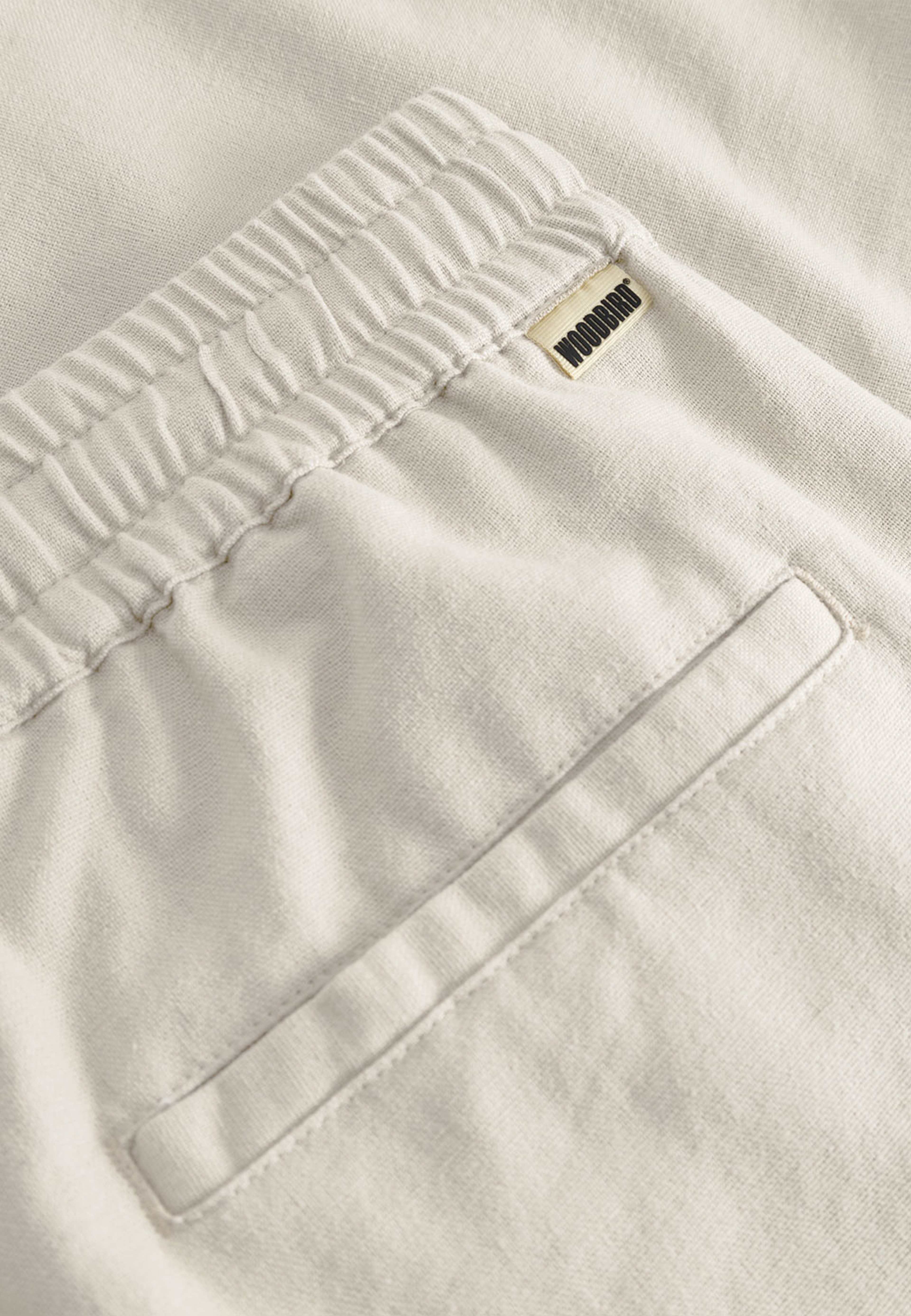 Eik Linen Pant, från Woodbird, i färgen Off White. Klicka för att öppna bilden i stort format