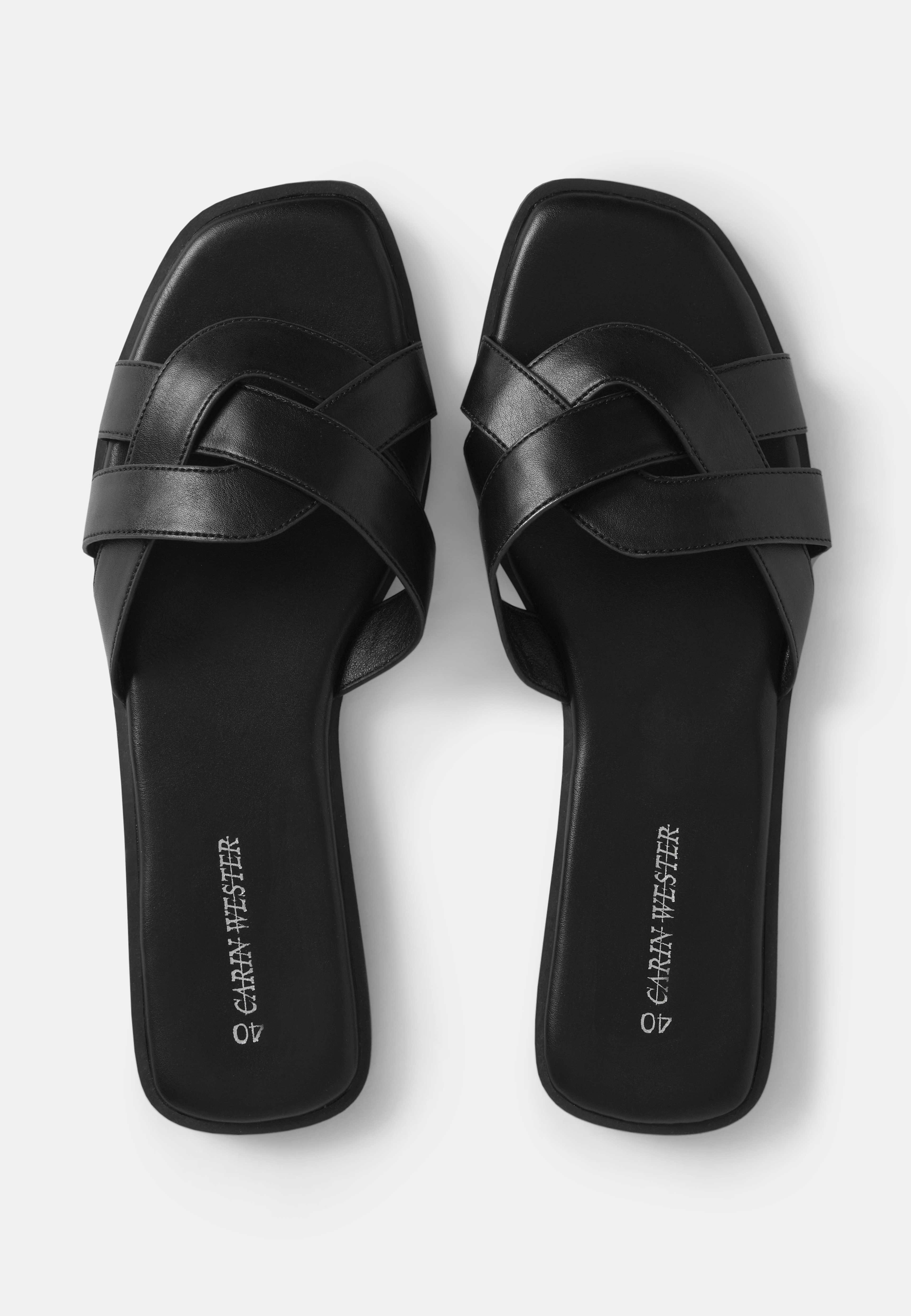 Slip in-sandaler, från Carin Wester, i färgen Black. Klicka för att öppna bilden i stort format