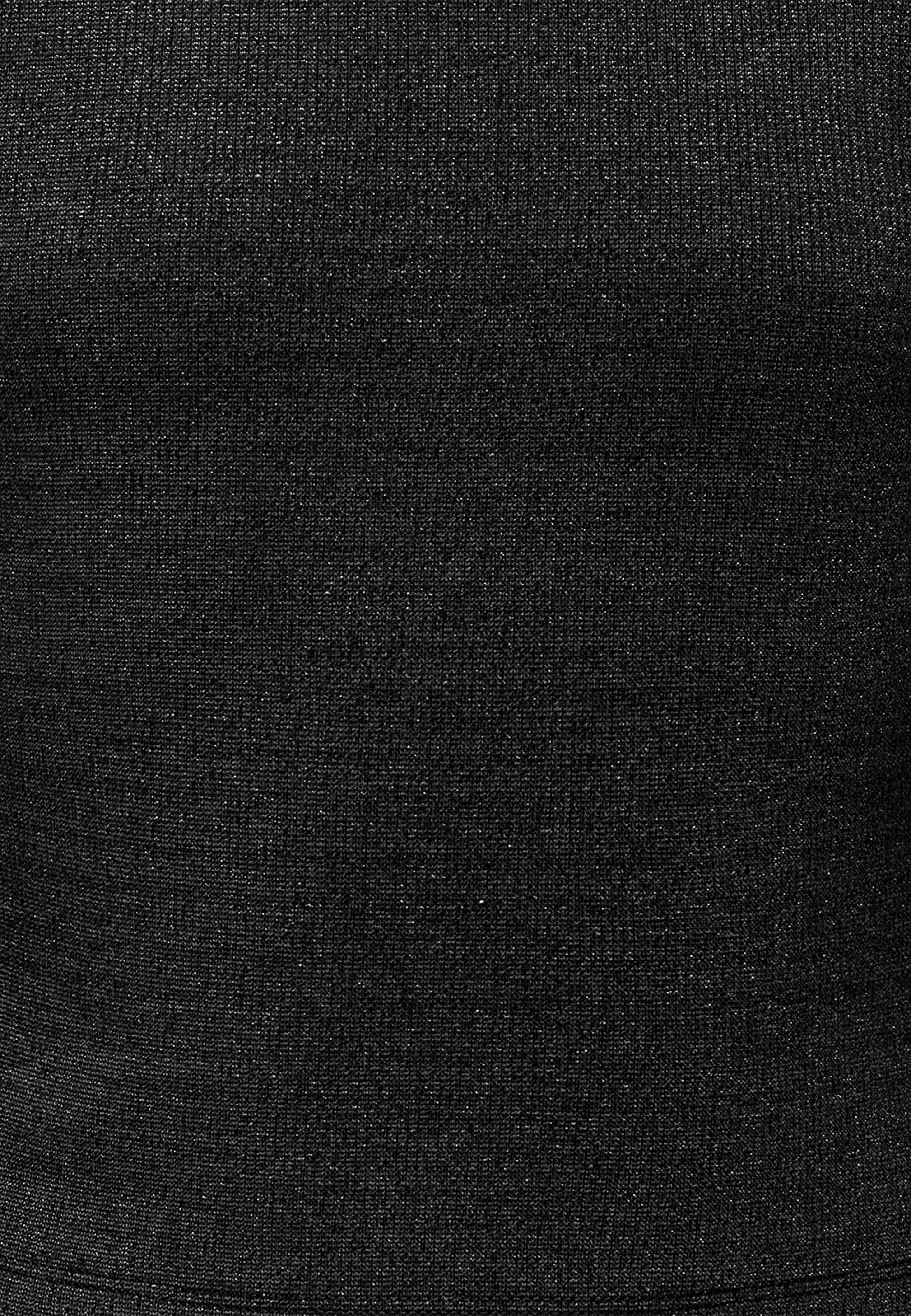 Glittrig topp KOGTRINNY, från Only, i färgen Black No Cut Out. Klicka för att öppna bilden i stort format