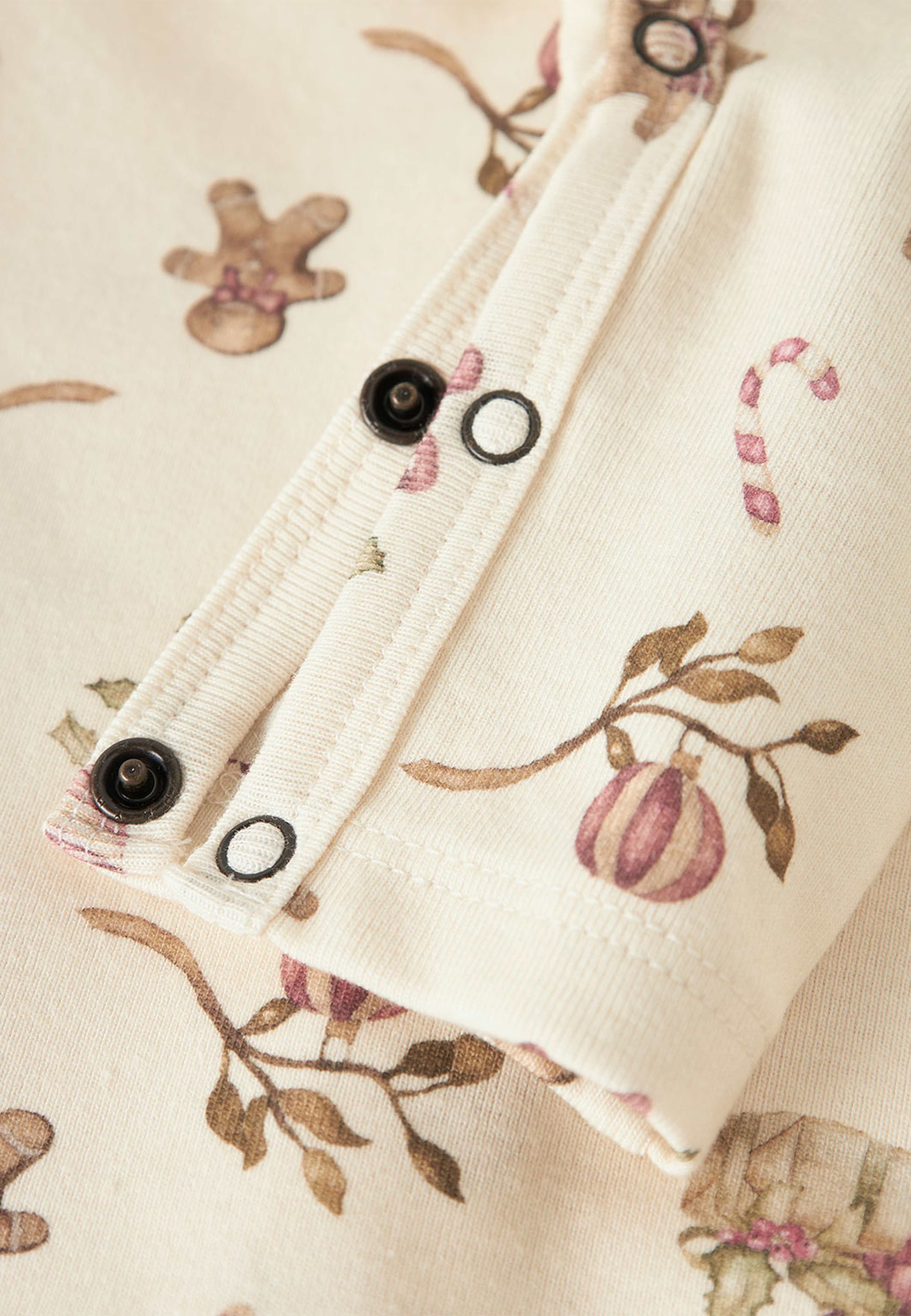 NBNLAYO Onesie, från Lil'Atelier, i färgen Turtledove Christmas. Klicka för att öppna bilden i stort format