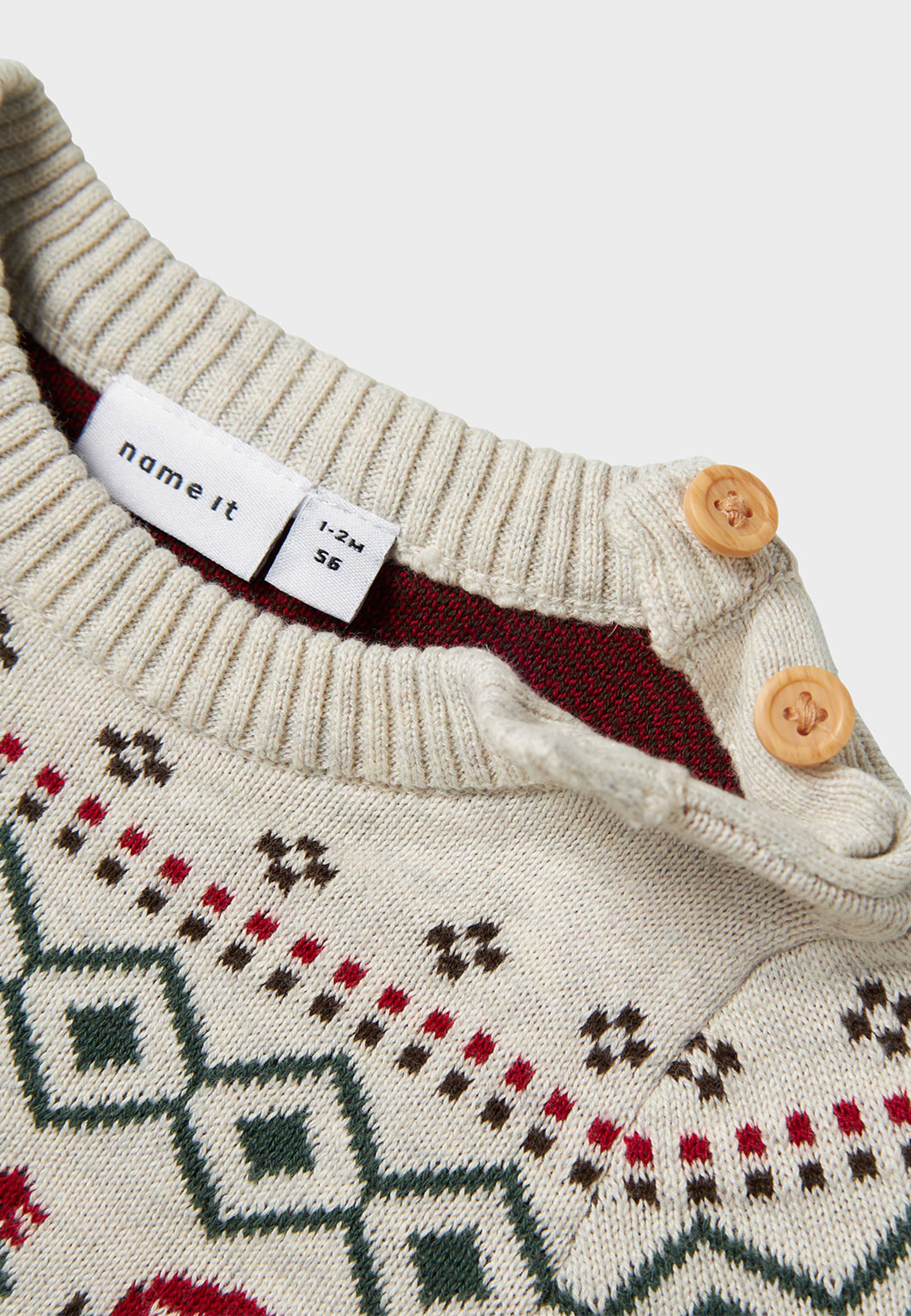 NBNRALKO Stickad onesie, från Name It, i färgen Peyote Melange. Klicka för att öppna bilden i stort format