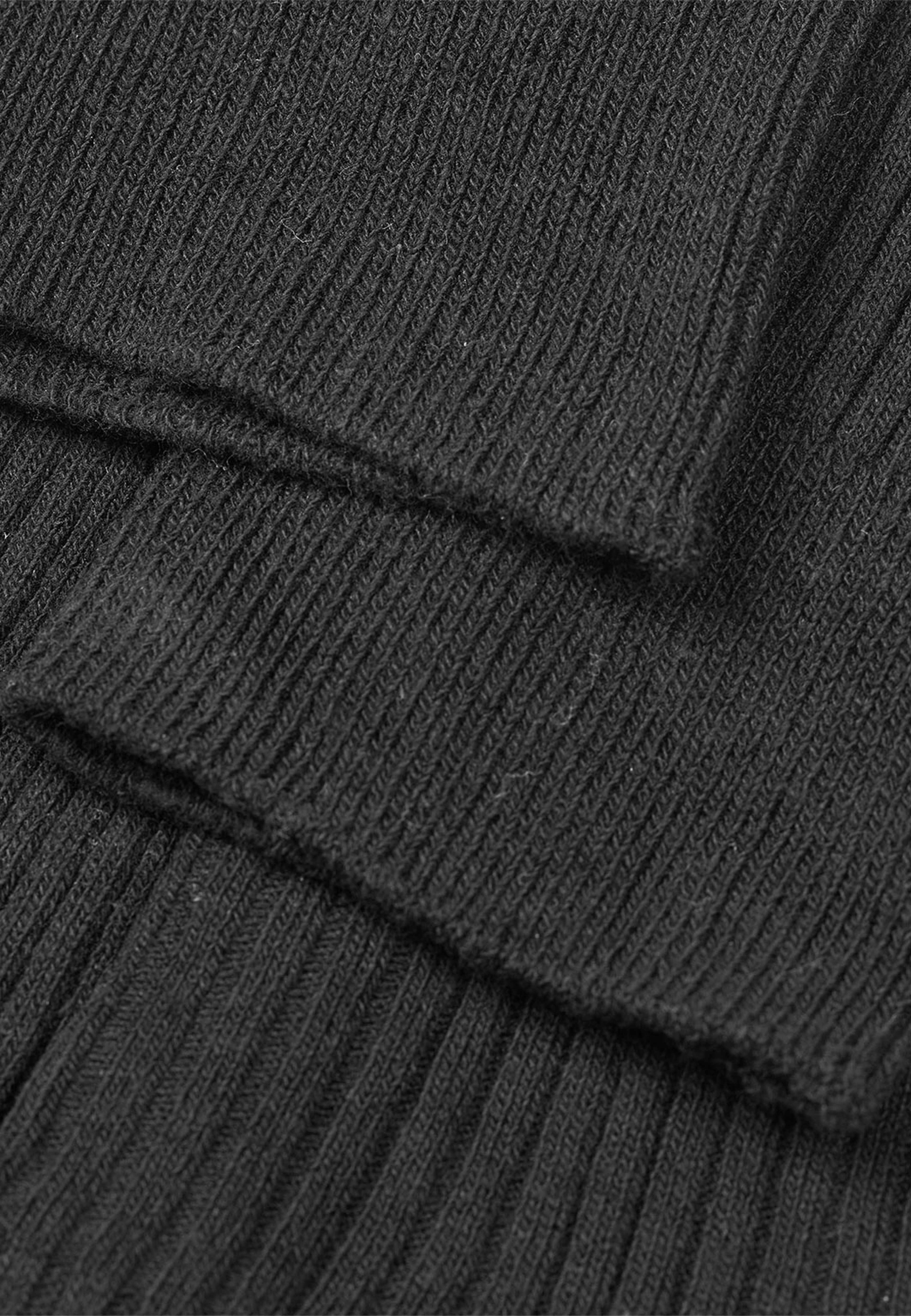 Sock Box Anton, från Mads Nørgaard, i färgen Black/Ecru 26-1. Klicka för att öppna bilden i stort format