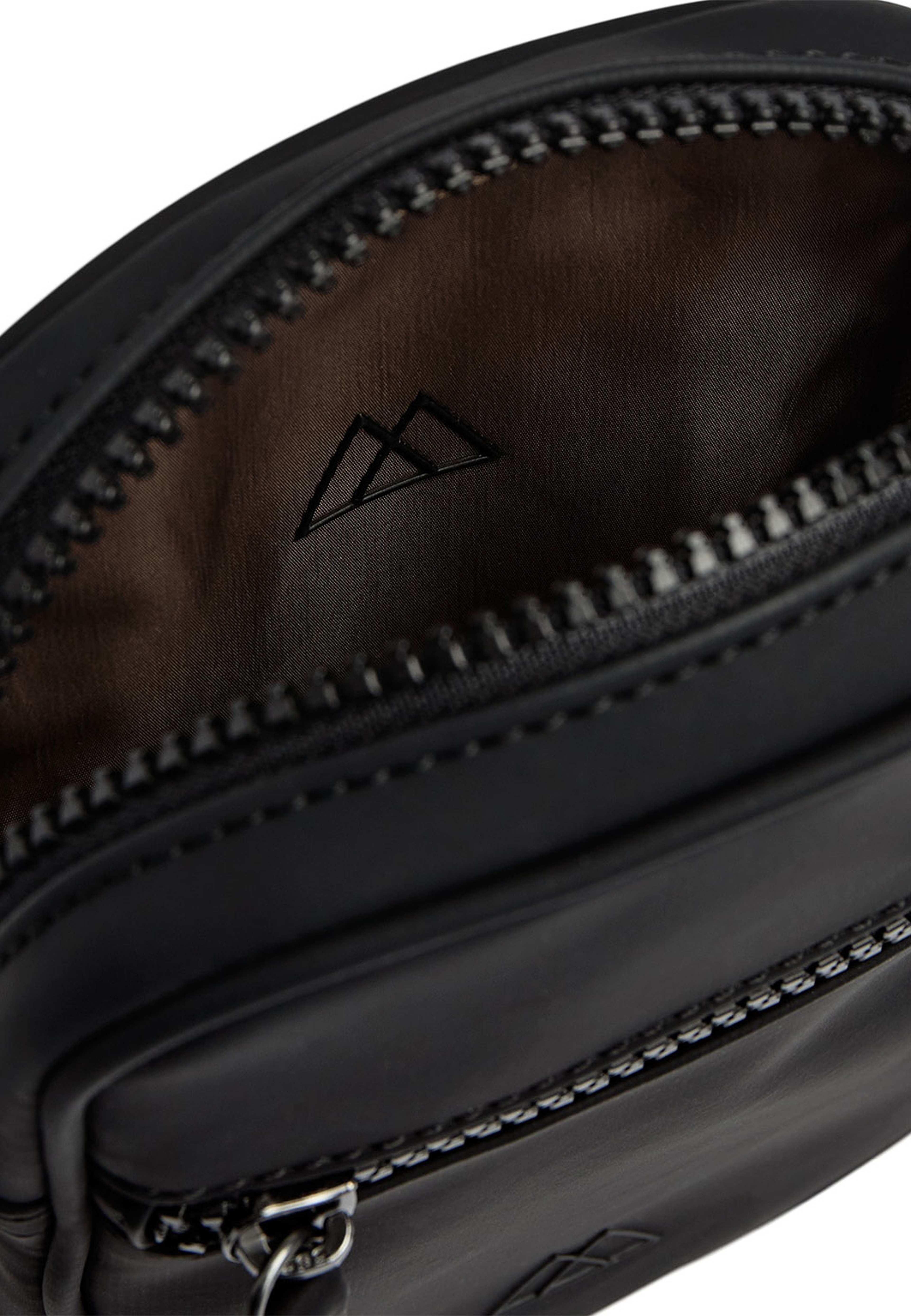 State Mini Crossbody Bag Rubber, från Markberg, i färgen Black. Klicka för att öppna bilden i stort format