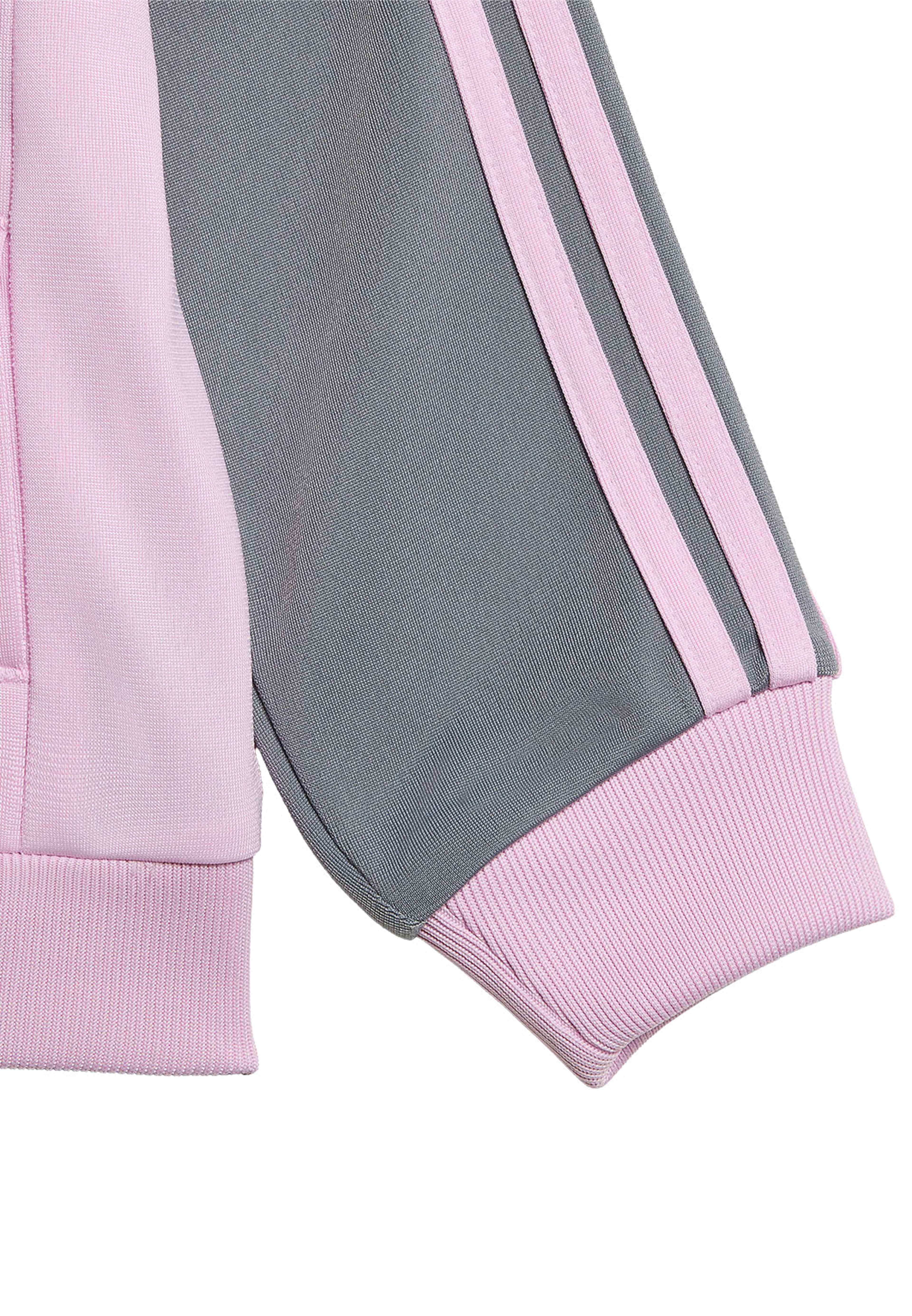 Tracksuit SST TS, från Adidas, i färgen Orcfus. Klicka för att öppna bilden i stort format