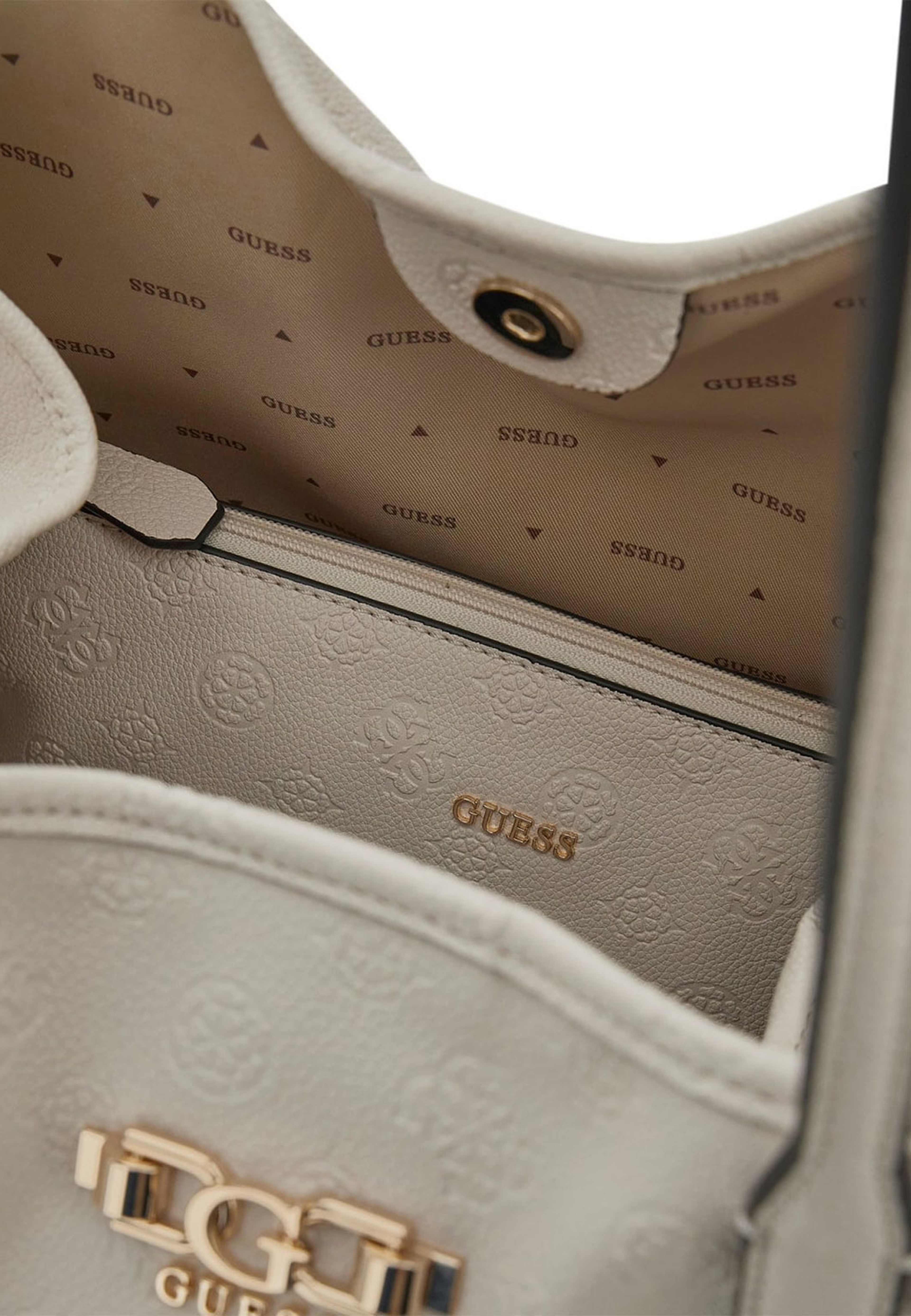 VICTTORIA LARGE 2 IN 1 TOTE, från Guess, i färgen Stone Logo. Klicka för att öppna bilden i stort format