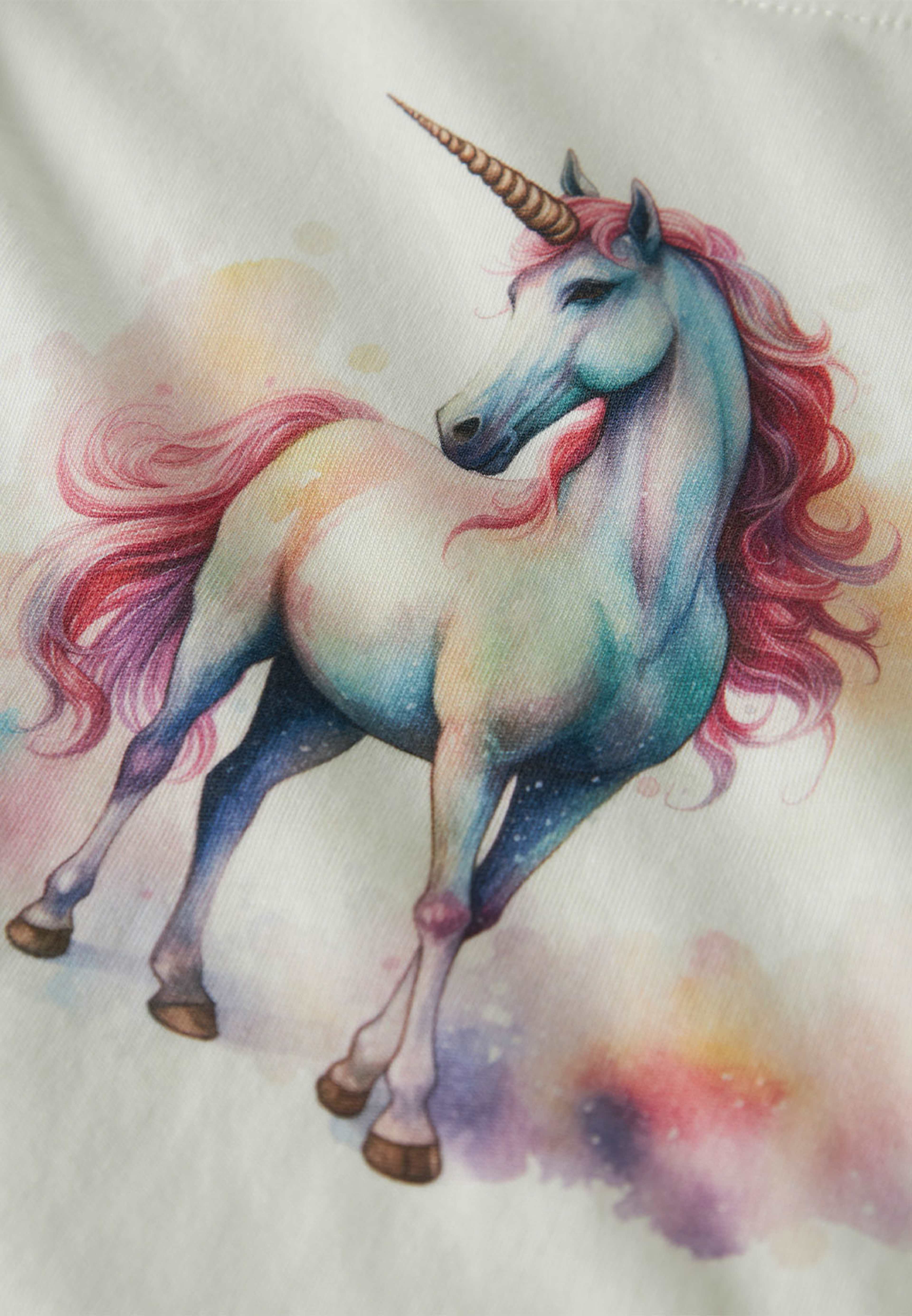 NMFVOTEA LS NREG TOP, från Name It, i färgen Cloud Dancer Pink Unicorn. Klicka för att öppna bilden i stort format