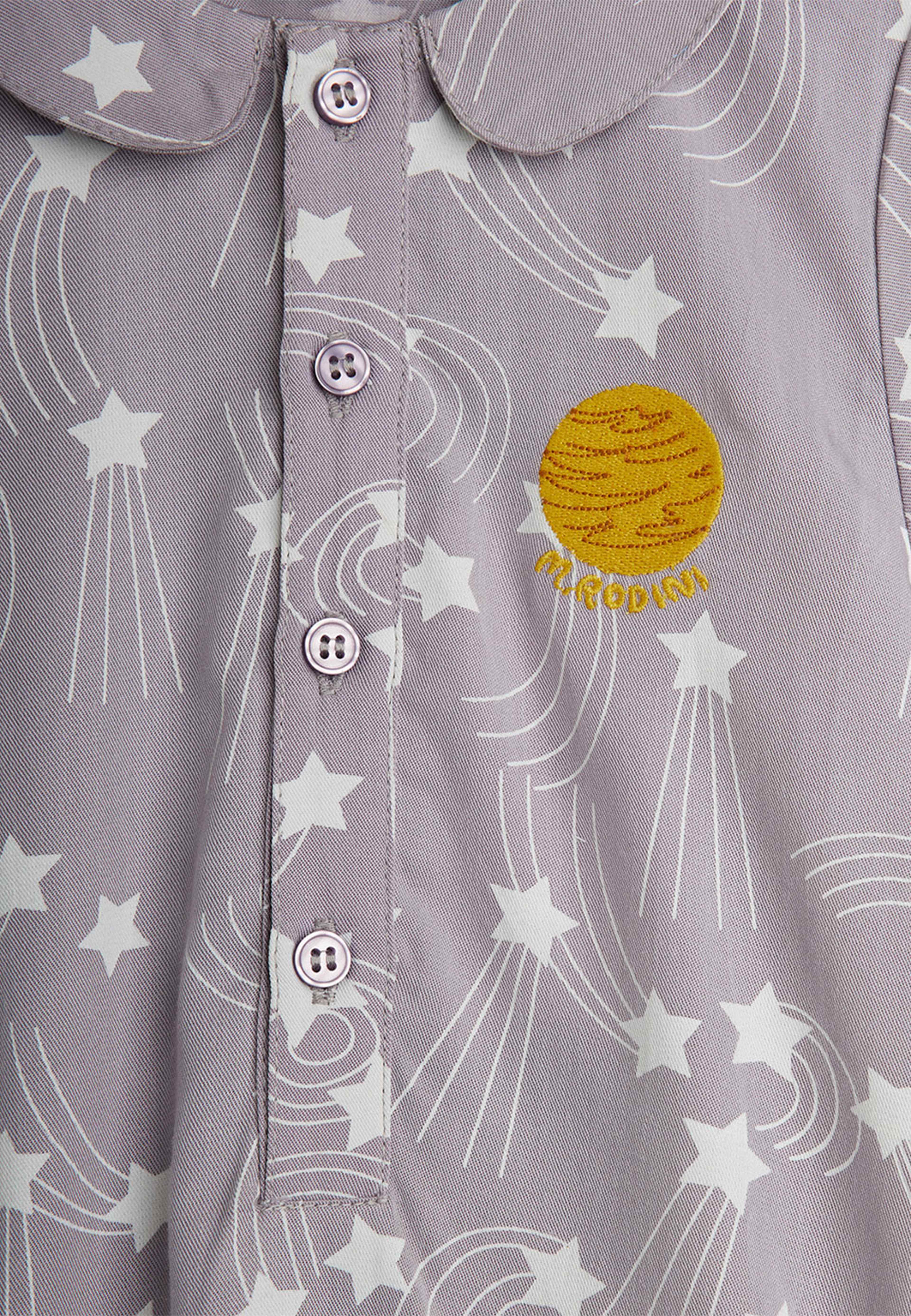 Starfall Print Body, från Mini Rodini, i färgen Purple. Klicka för att öppna bilden i stort format