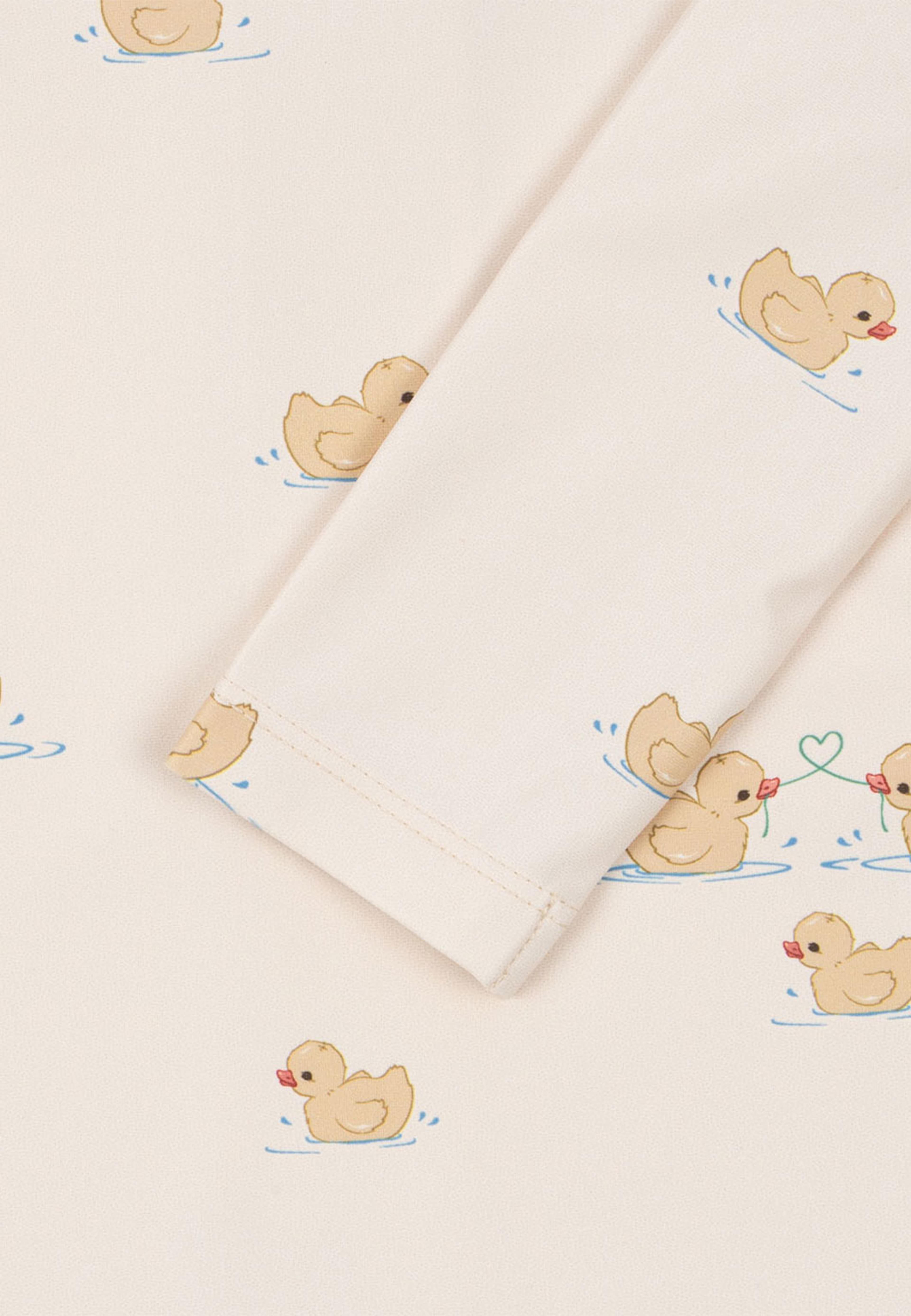 Como Swim Onesie Grs, från Fanga Fontana, i färgen Fanga Mio. Klicka för att öppna bilden i stort format