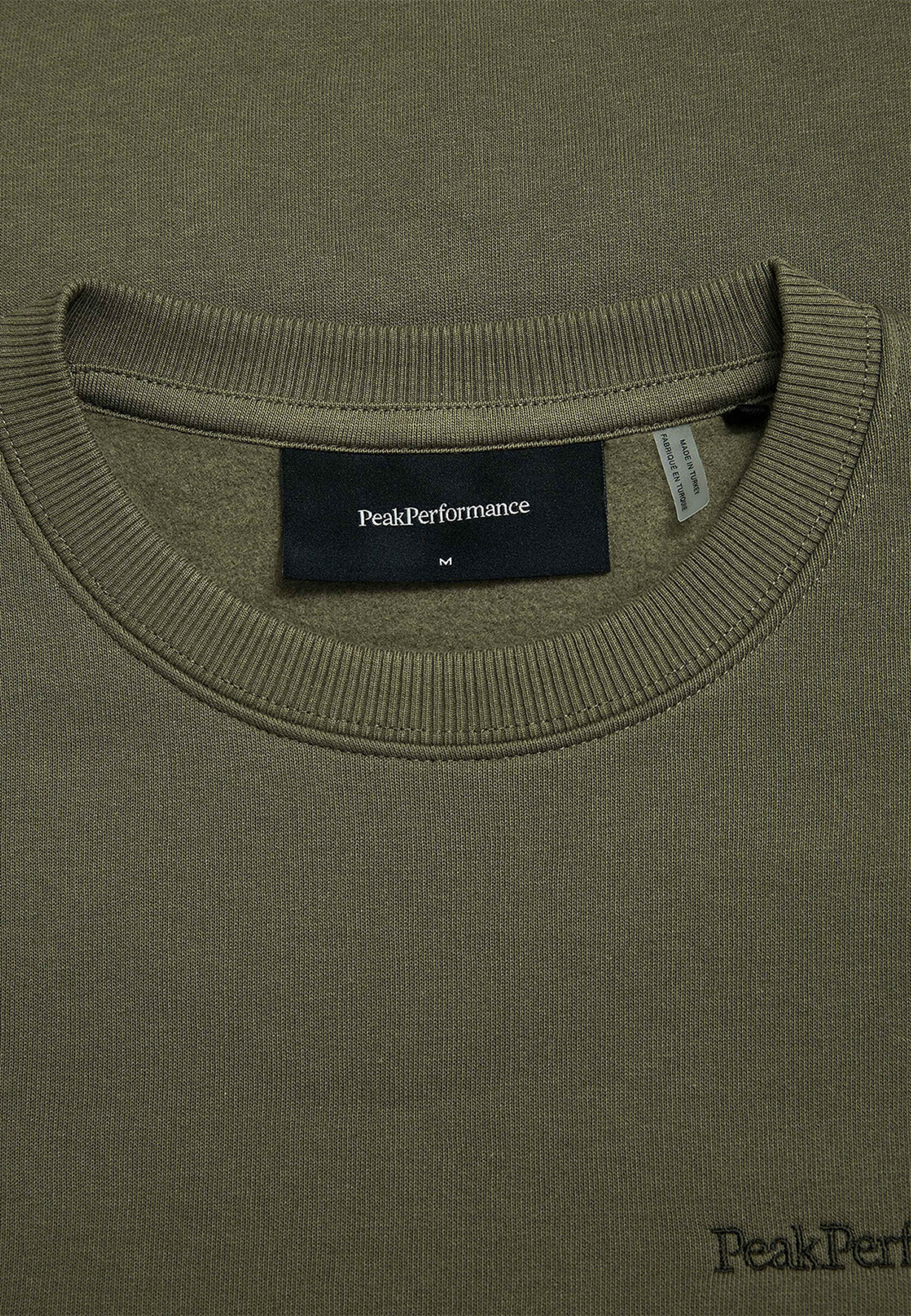 M Original Small Logo Crew, från Peak Performance, i färgen Pine Needle. Klicka för att öppna bilden i stort format