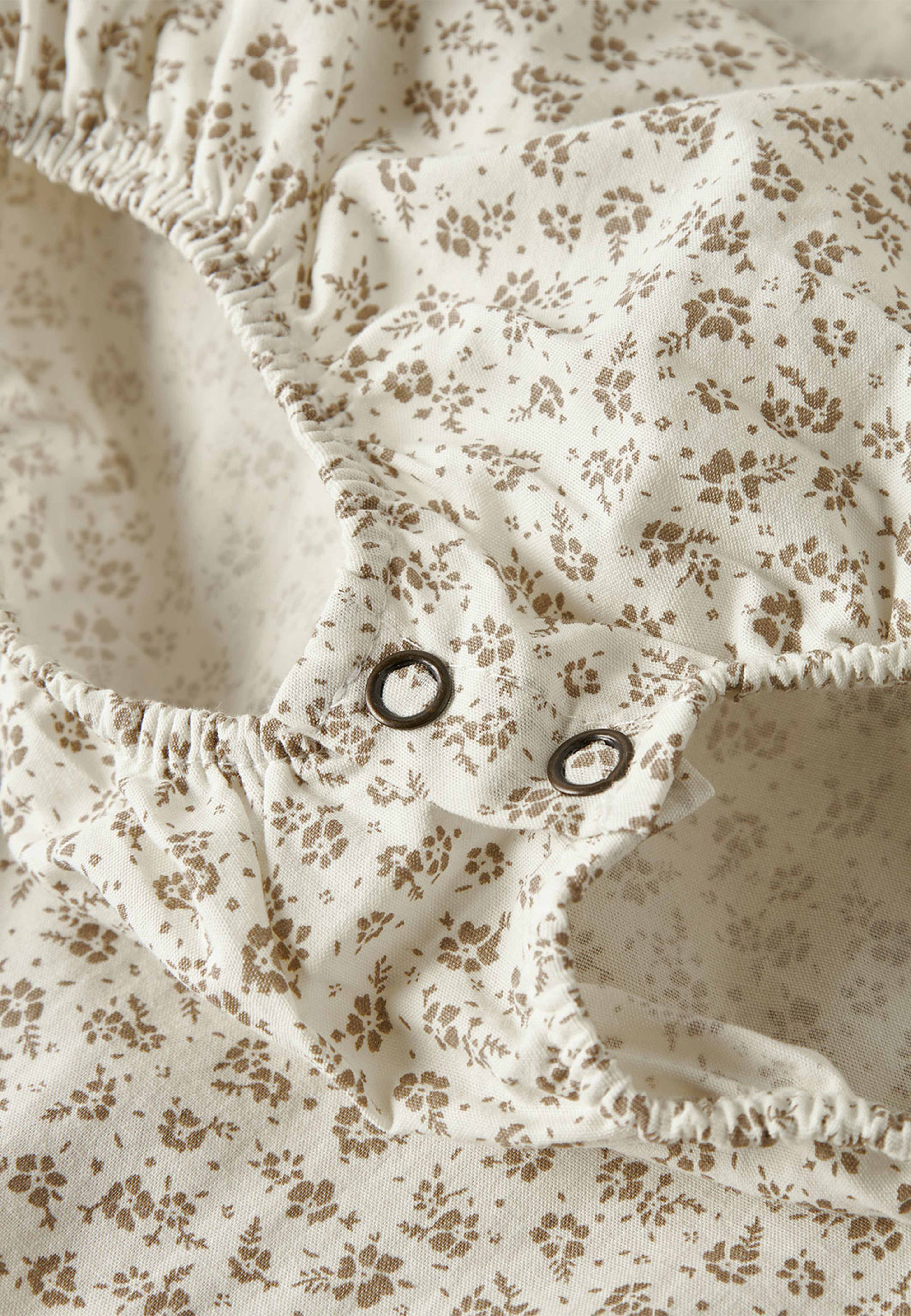 Bodyklänning Lil, från Lil'Atelier, i färgen Coconut Milk. Klicka för att öppna bilden i stort format