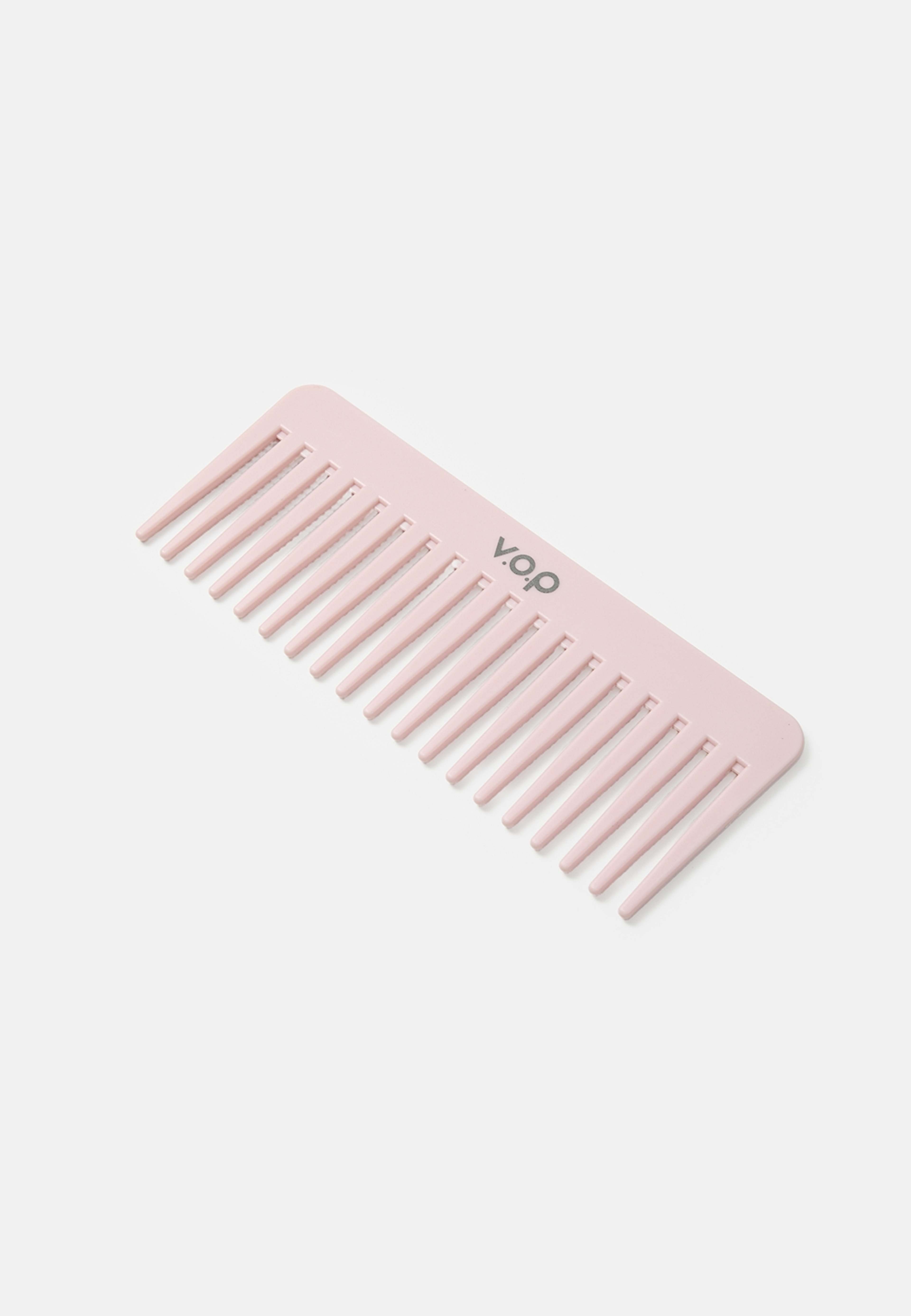 Wide Detangle Comb, från v.o.p, i färgen Lt Pink. Klicka för att öppna bilden i stort format