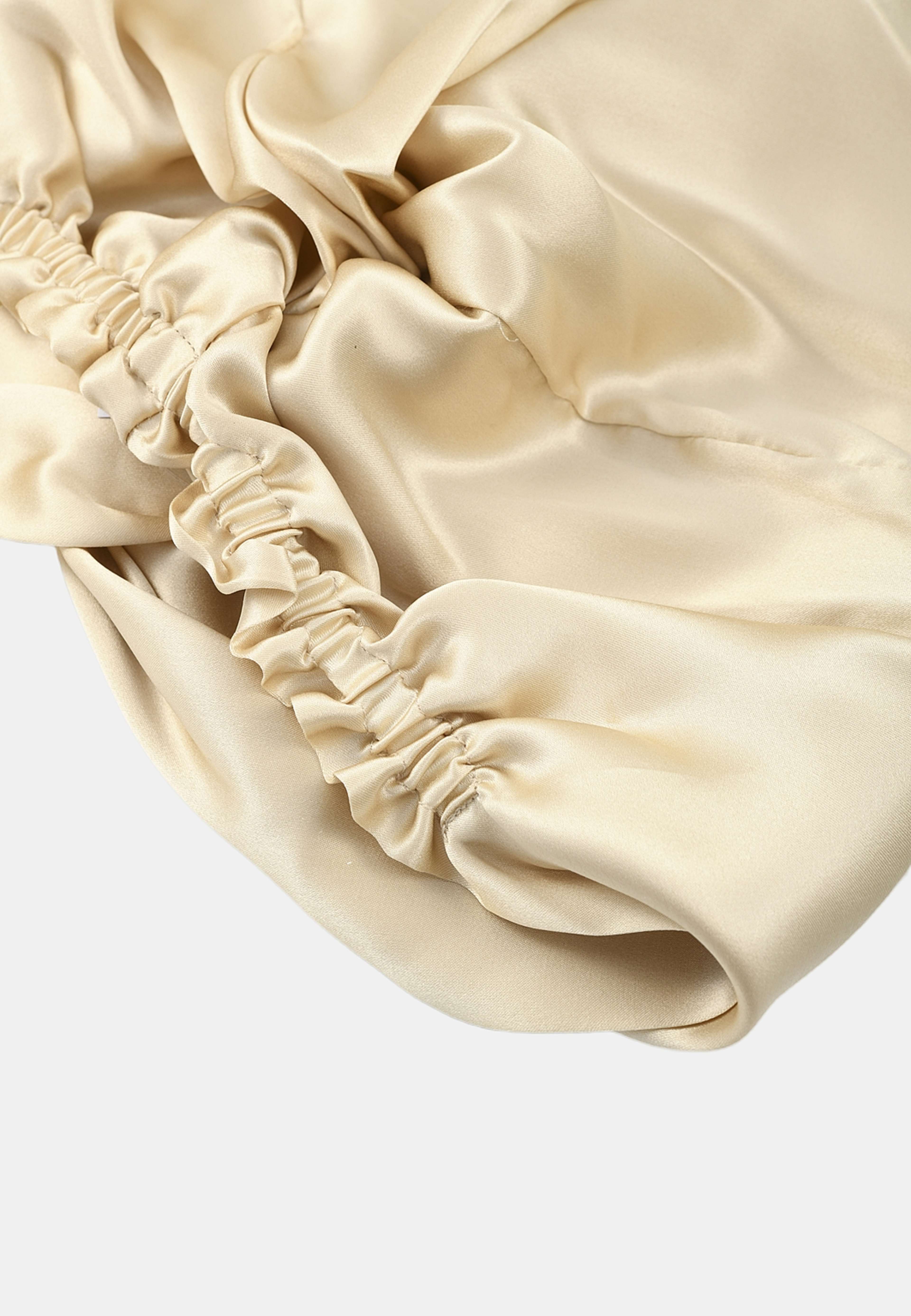 Silk Bonnet, från Å BEAUTY, i färgen Champagne. Klicka för att öppna bilden i stort format