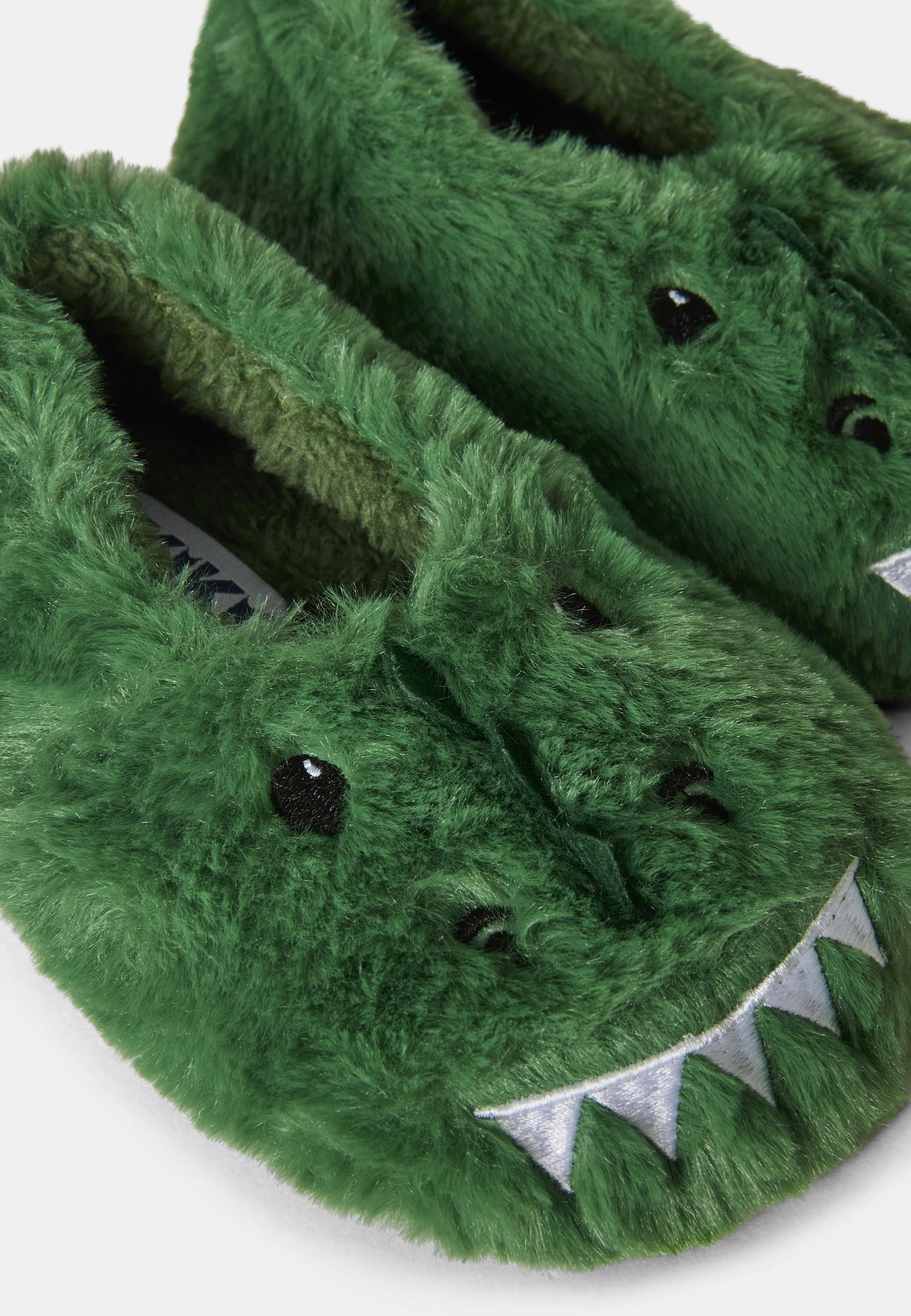 Dinosaurietofflor, från RIKIKI, i färgen Dino. Klicka för att öppna bilden i stort format