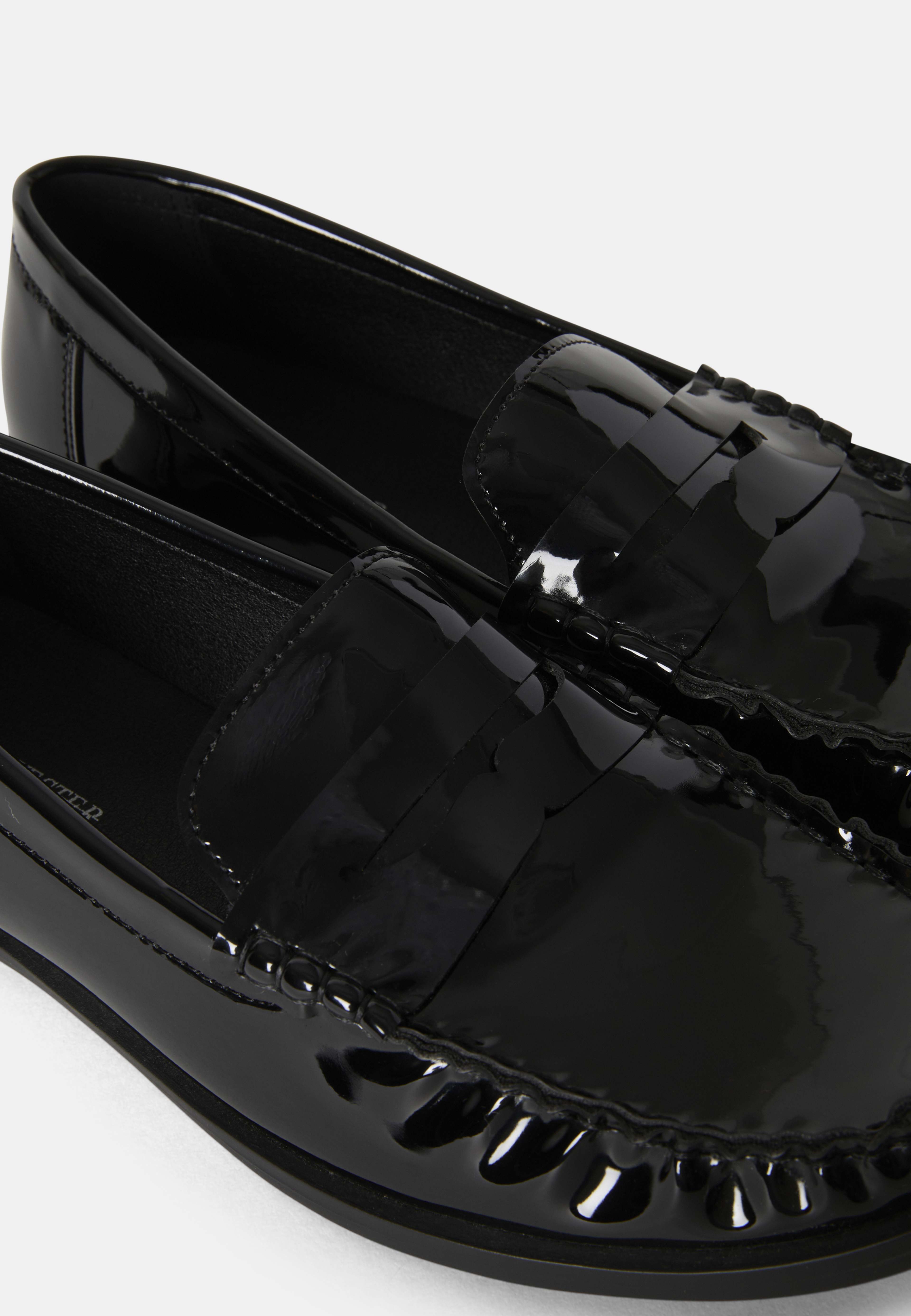 Blanka penny loafers, från Carin Wester, i färgen Black. Klicka för att öppna bilden i stort format