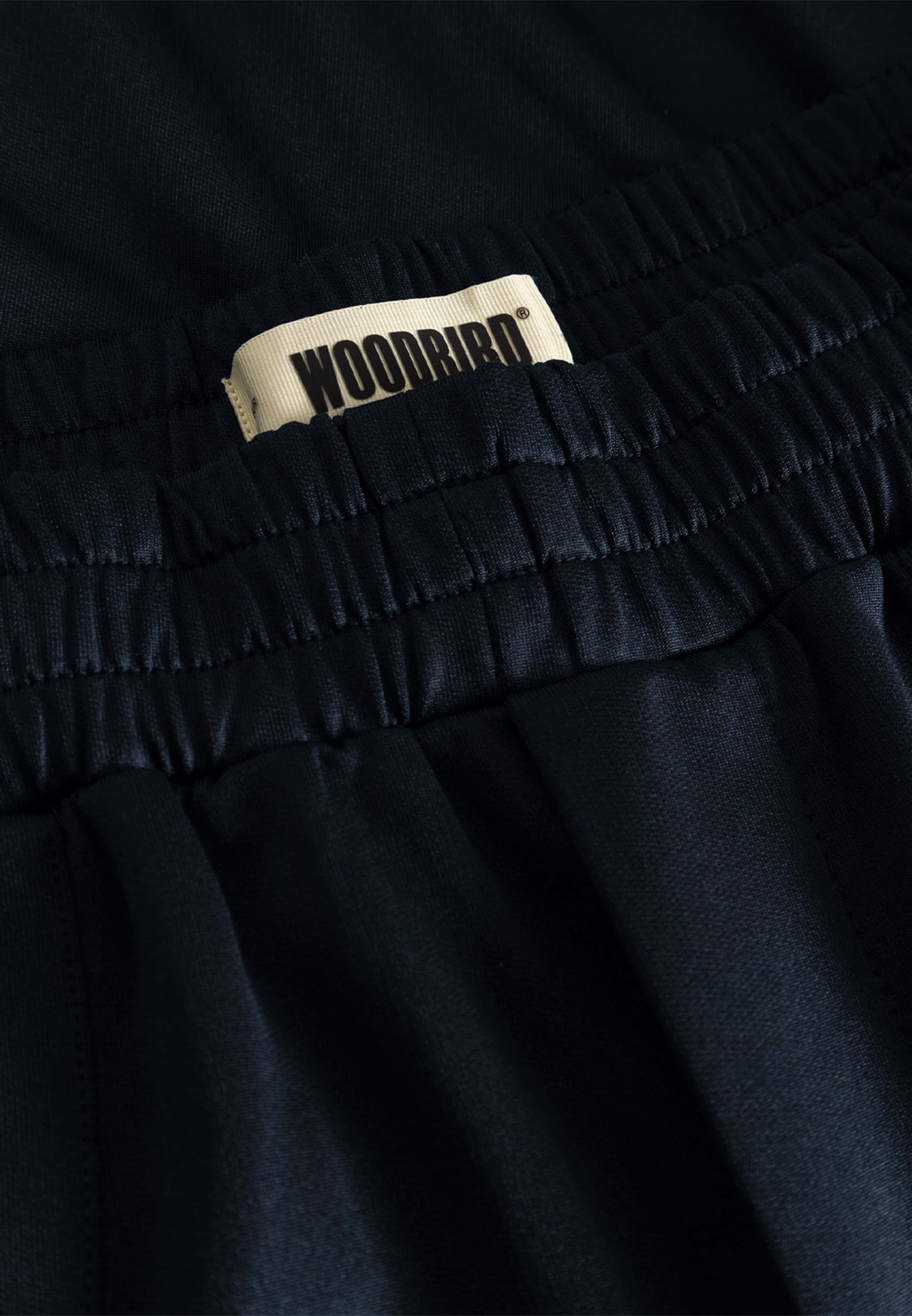 Chang Track Pants, från Woodbird, i färgen Dark Navy. Klicka för att öppna bilden i stort format