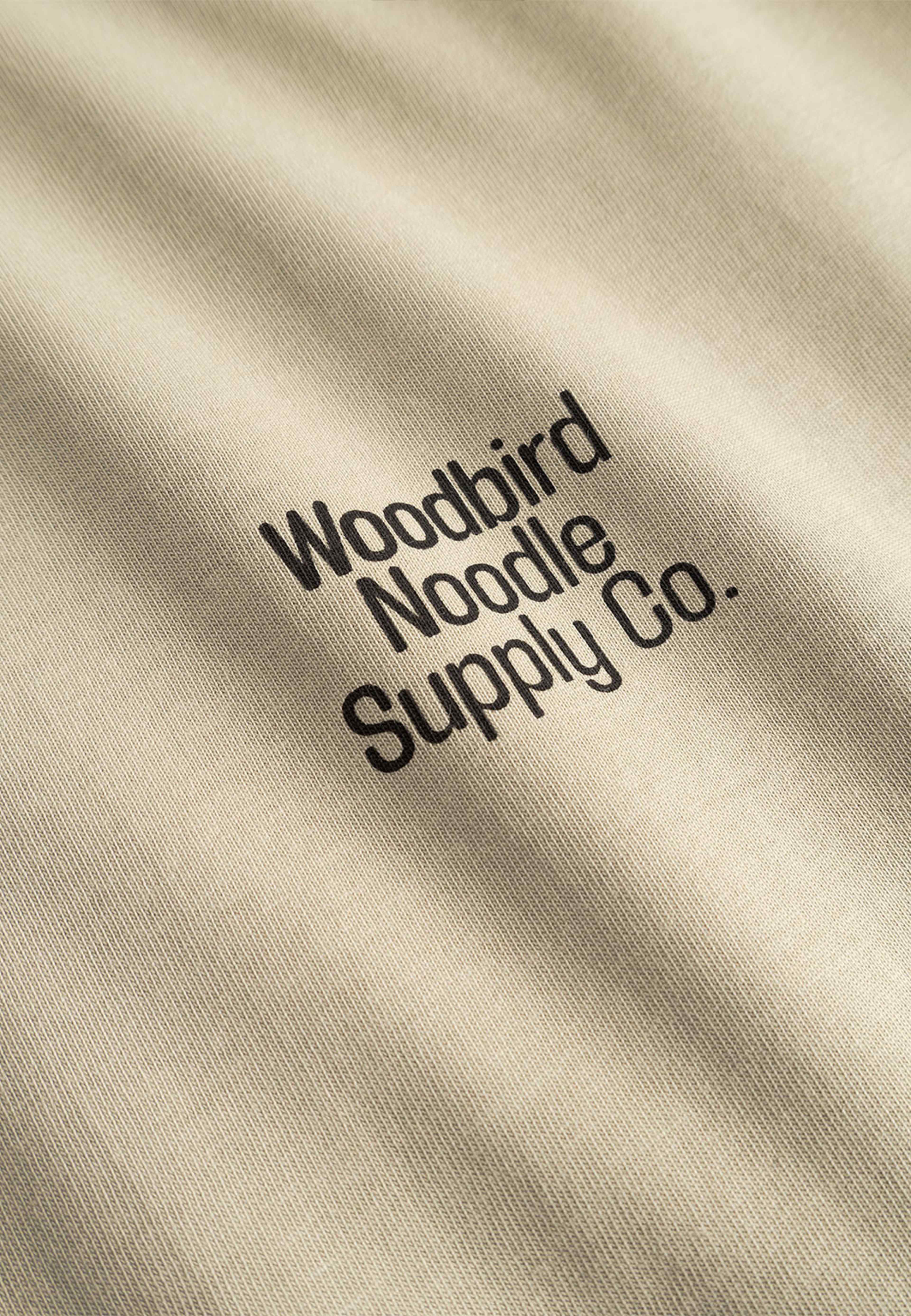 Blake Supply Tee, från Woodbird, i färgen Stone. Klicka för att öppna bilden i stort format