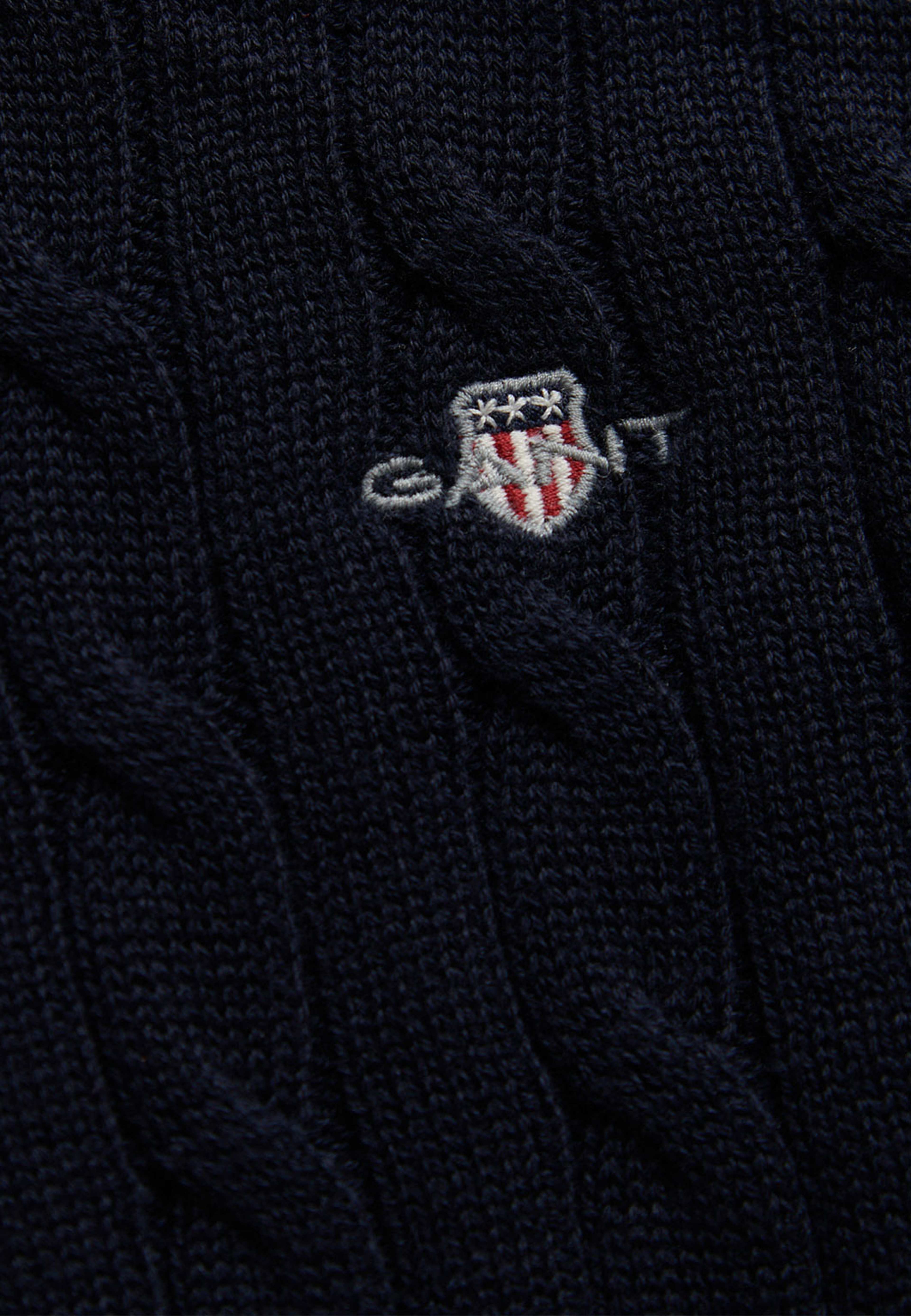 Sweater Shield Cotton Cable Neck Sweater, från GANT, i färgen Evening Blue. Klicka för att öppna bilden i stort format