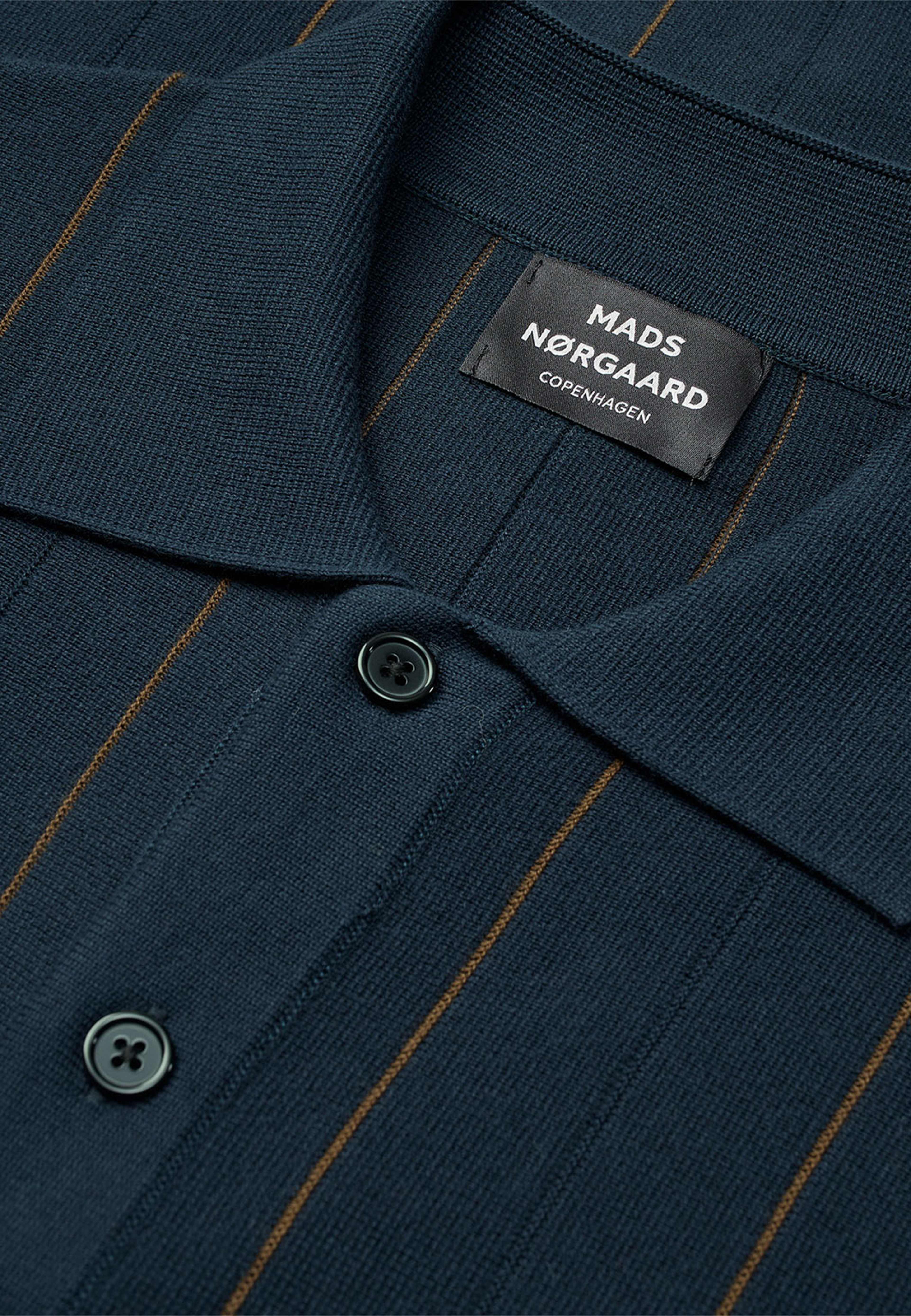 Classy Brando Polo LS Knitwear, från Mads Nørgaard, i färgen Sky Captain. Klicka för att öppna bilden i stort format