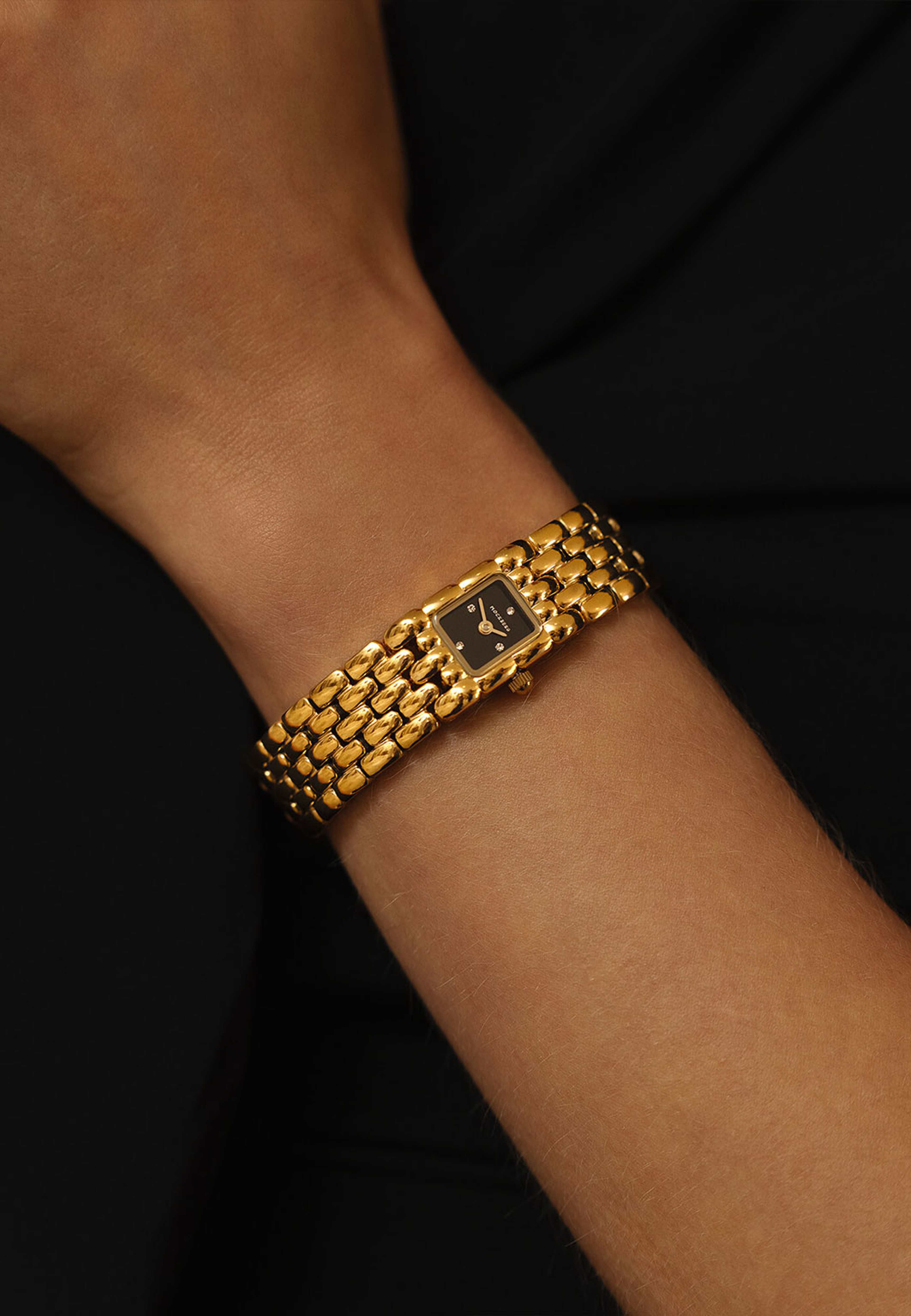 Eternal Gold Noir Watch, från Mockberg, i färgen Gold. Klicka för att öppna bilden i stort format