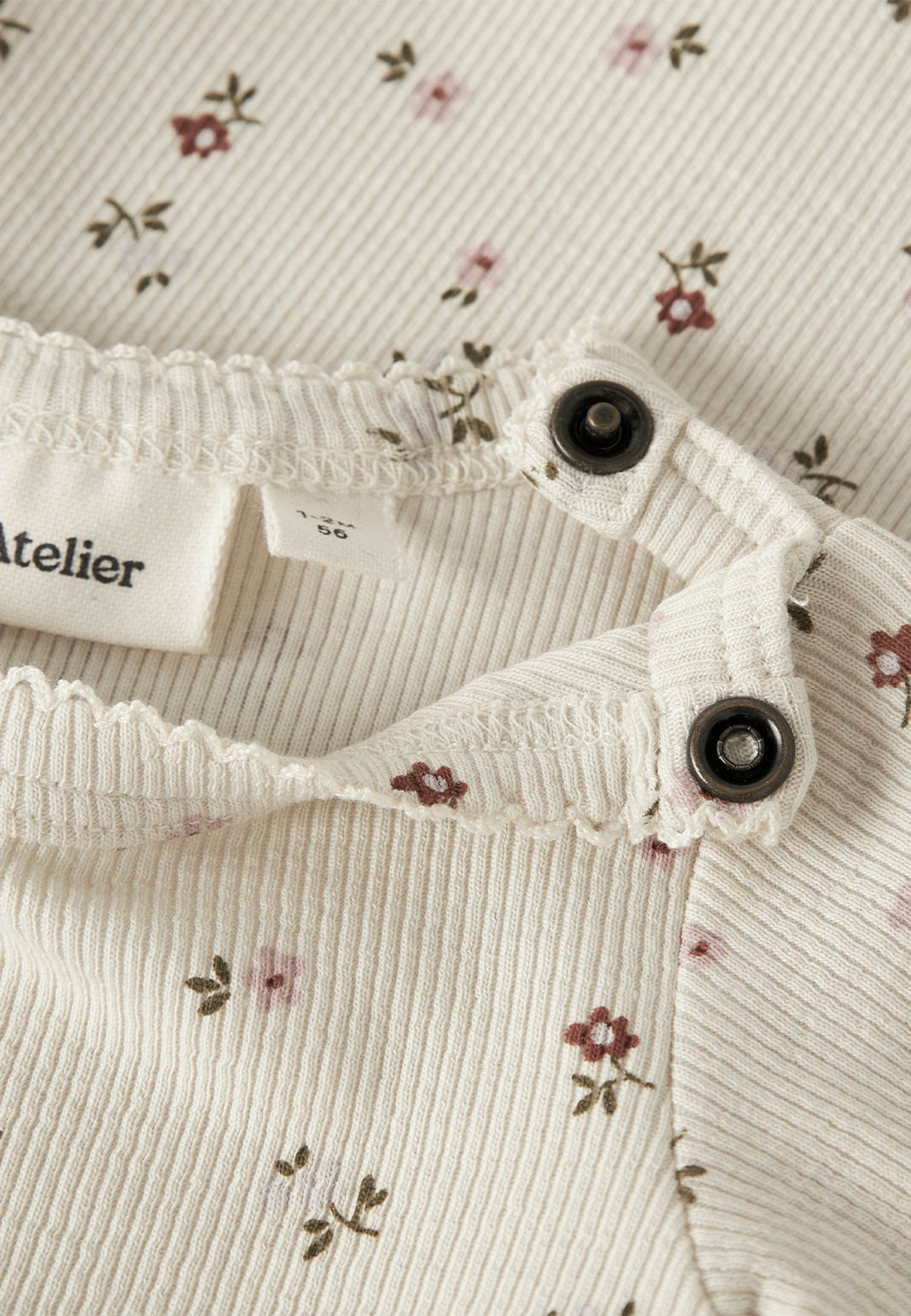 Gago slim body, från Lil'Atelier, i färgen Turtledove Floral. Klicka för att öppna bilden i stort format