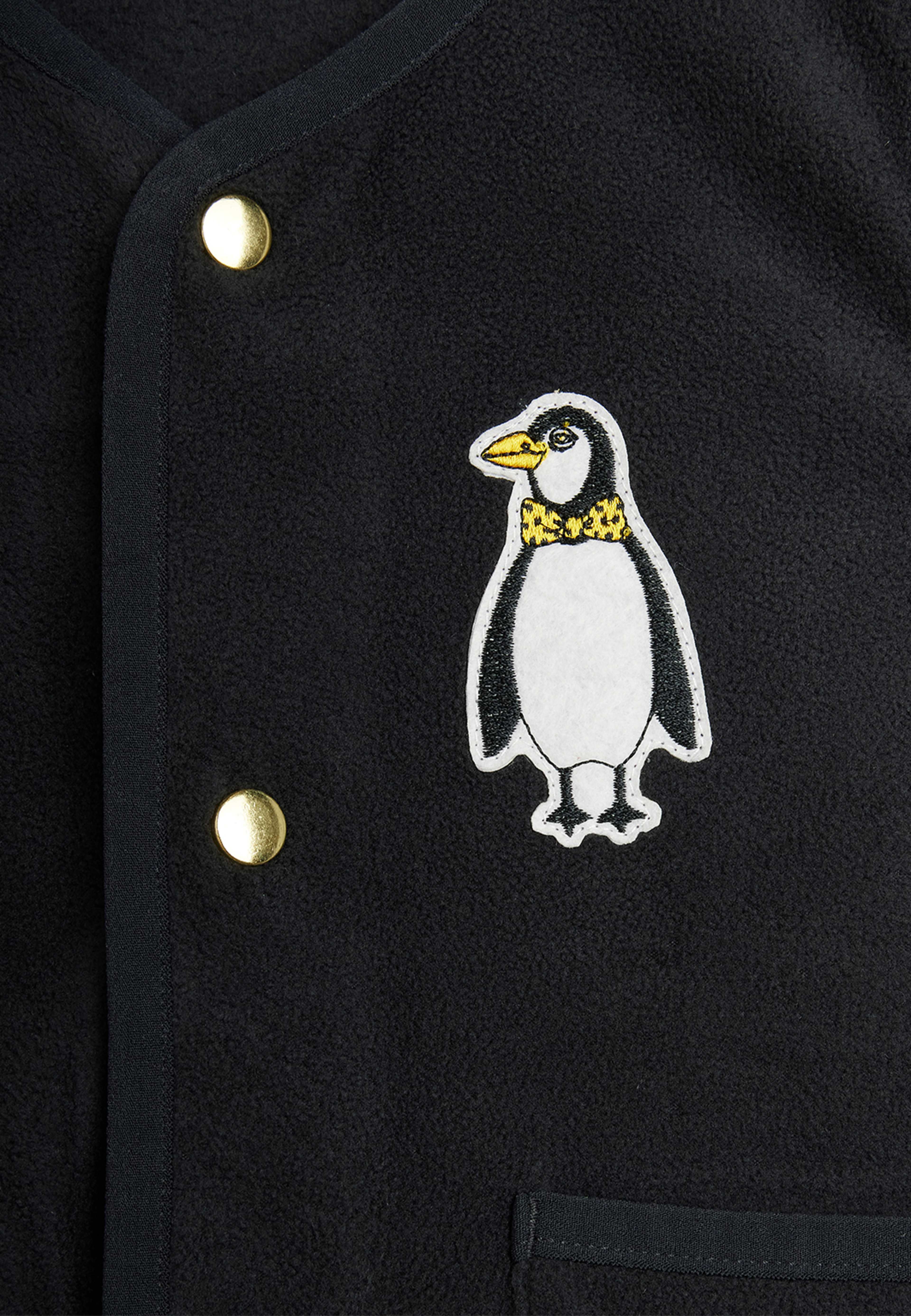 Penguin patch microfleece vest, från Mini Rodini, i färgen Black. Klicka för att öppna bilden i stort format